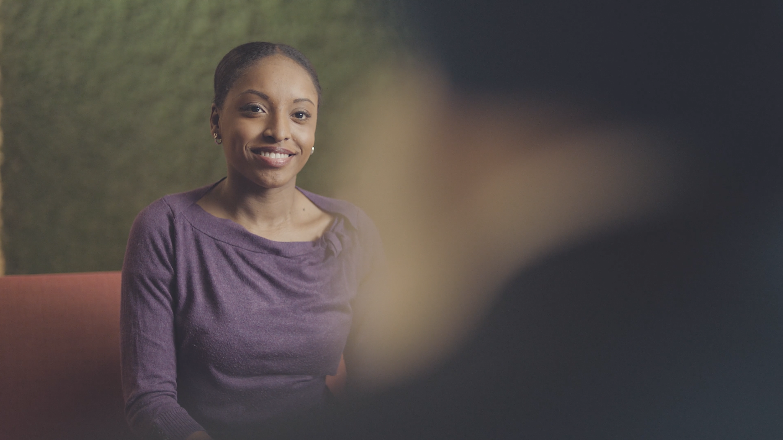 A woman getting interviewed