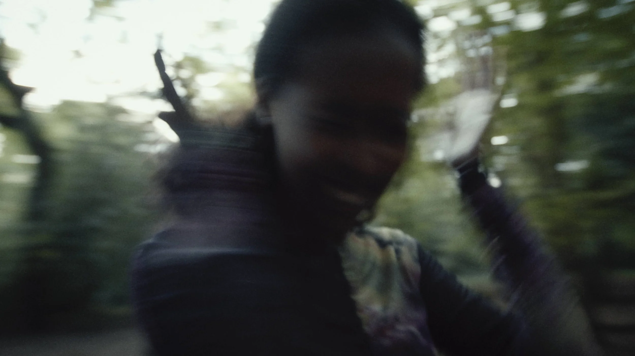 A girl screams in a forest