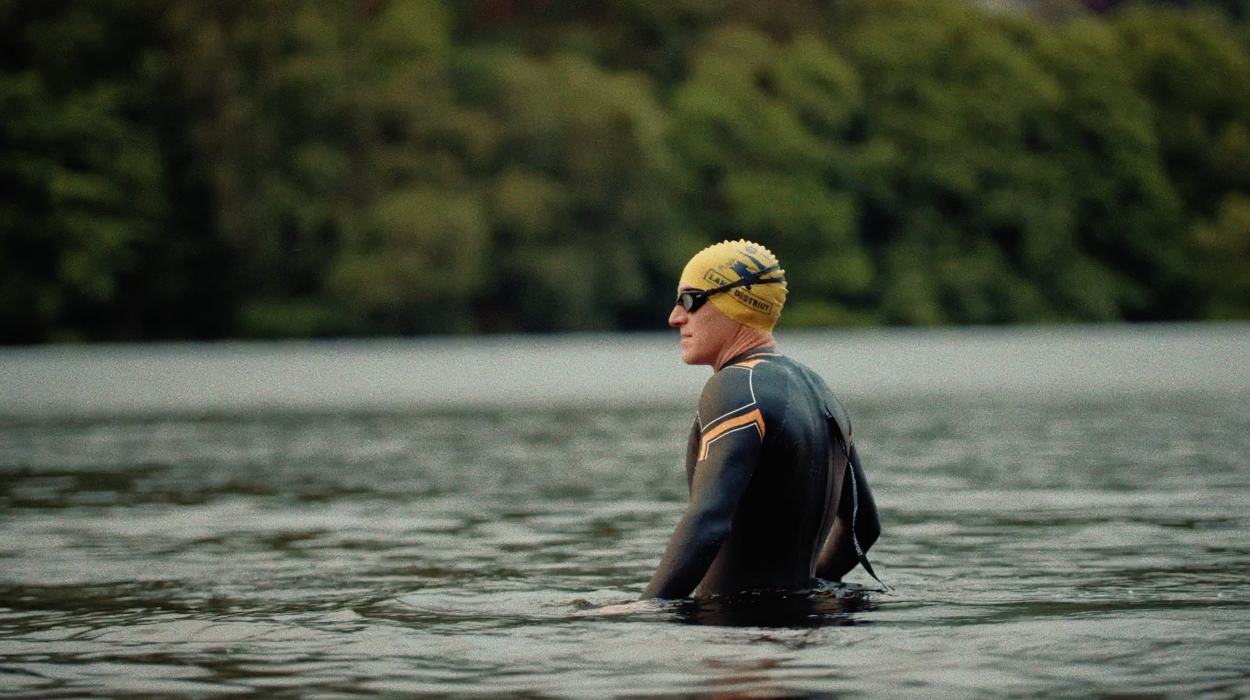 Wild-Swimmer-gets-into-lake-in-Lake-district-in-a-documentary-for-Swimtrek-by-writer-director-editor-Jess-Dowse.png