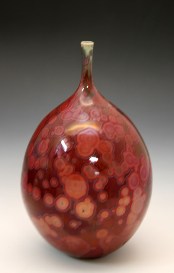 Keith Herbrand copper red bottle reduced.jpg