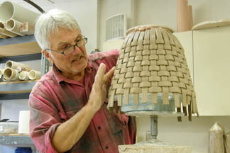 Jim parmentier working in clay low res.jpg