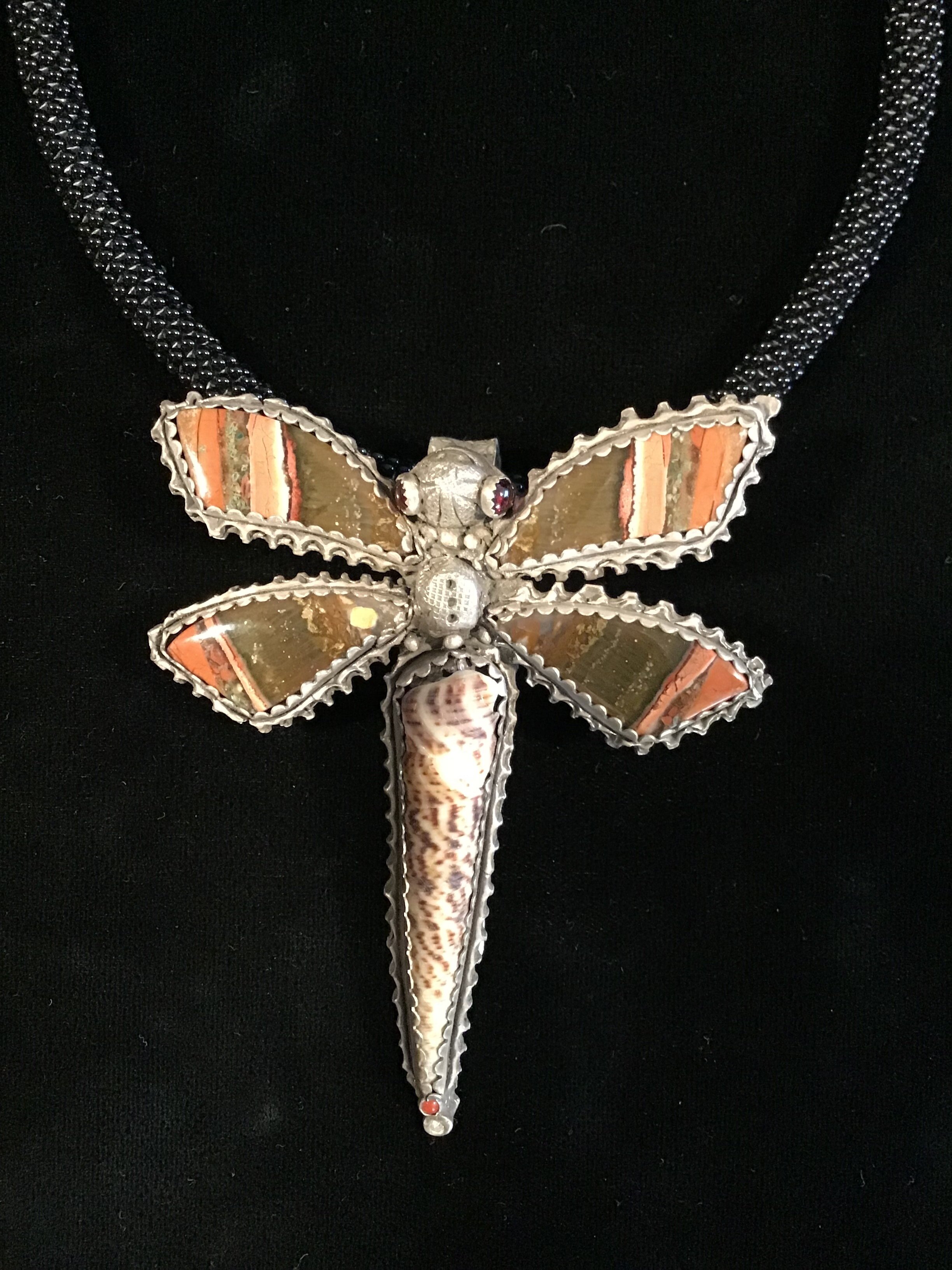 Ellen Cole Dragonfly on necklace.jpg