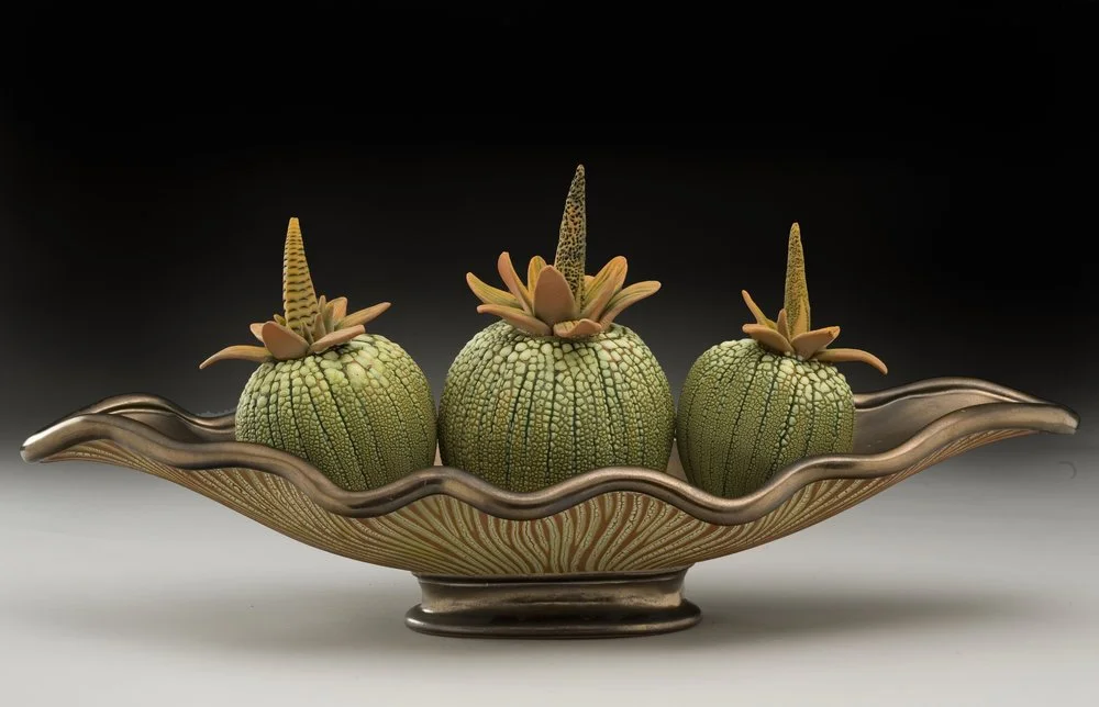 Kidd Bill gourds in a oblong boat.jpeg