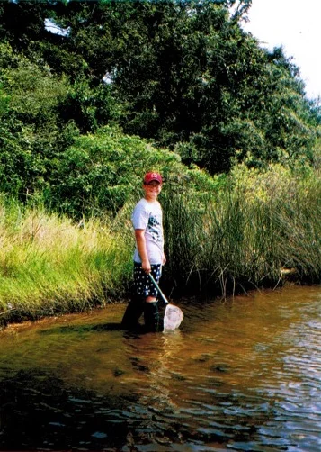 Reid collecting organisms in the vicinity of Dead Man's Island, Pensacola Bay, Florida. 