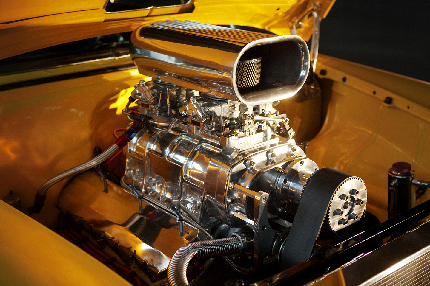 ​The New Engine of a 1955 Yellow Chevy