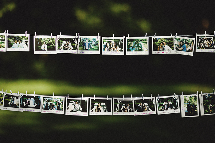 polaroid wedding guest book hung on string