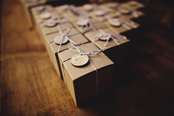 kraft box favors tied with bakers twine and wooden disks
