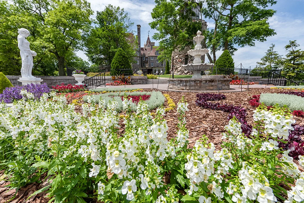 The castle is surrounded by lovely gardens.