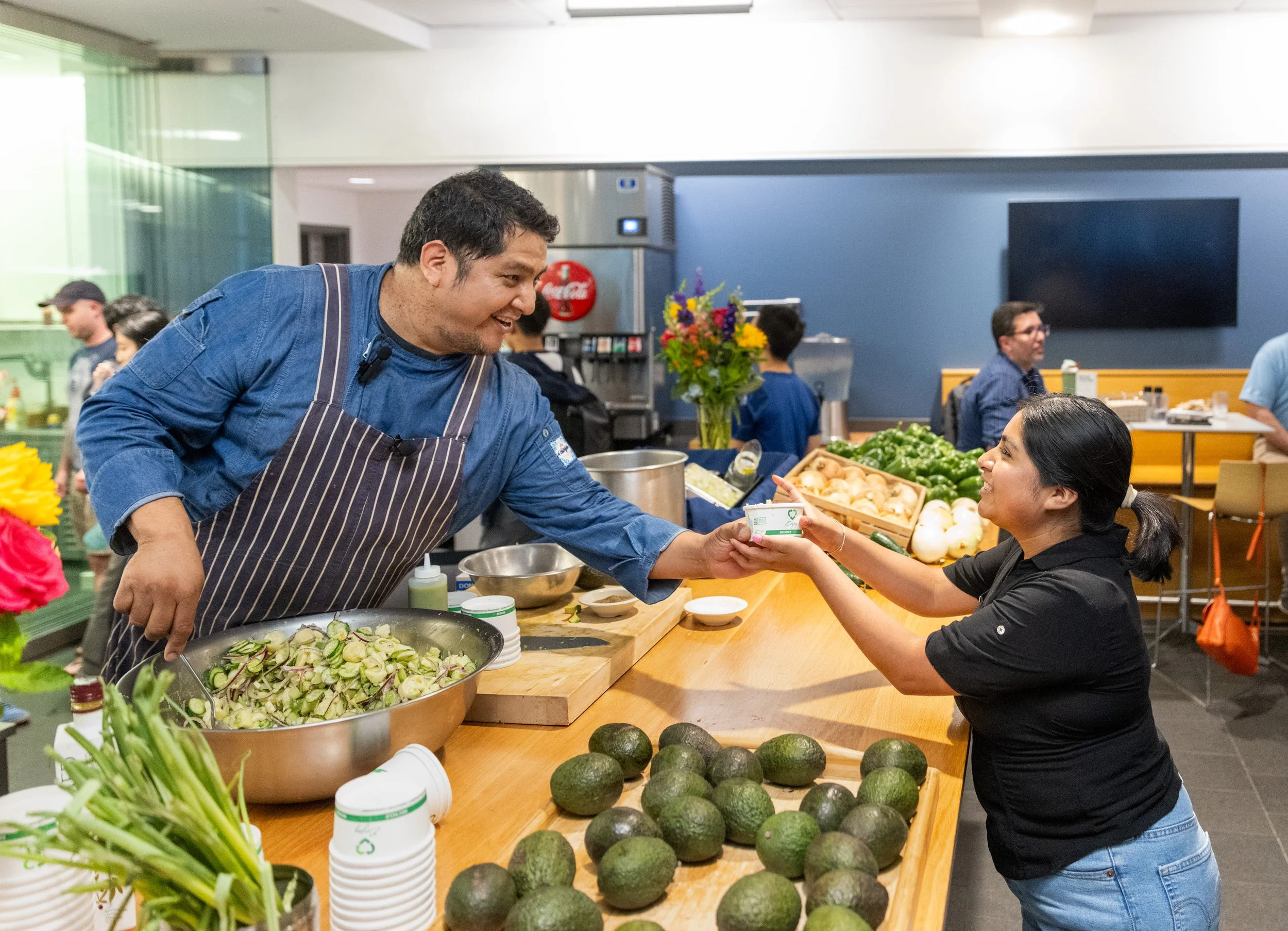   Carlos answered questions from the audience while serving up some sides.   