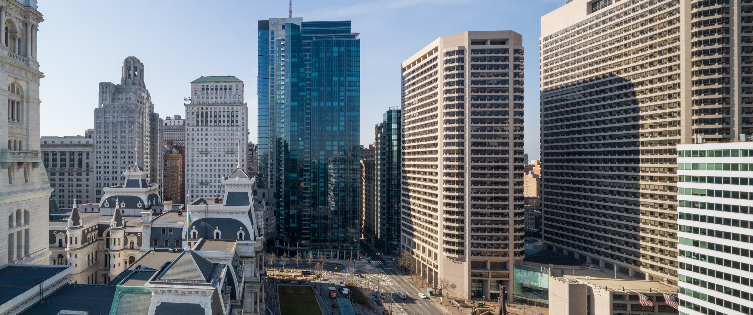   This drone view shows City Hall on the left surrounded by more modern buildings.  