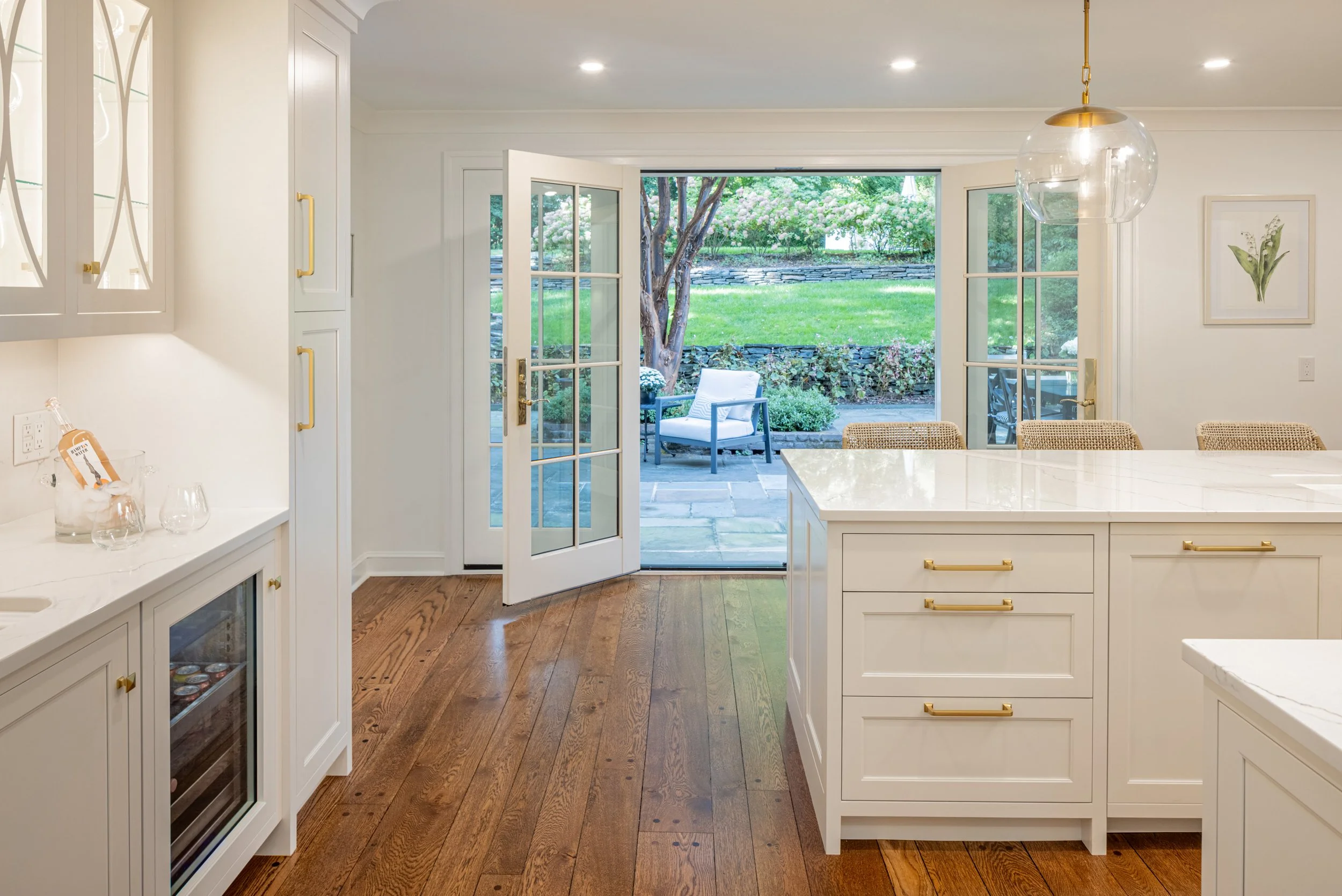  Grab a bite and get back out there! Glass doors connect the kitchen to a dining area on the patio.  