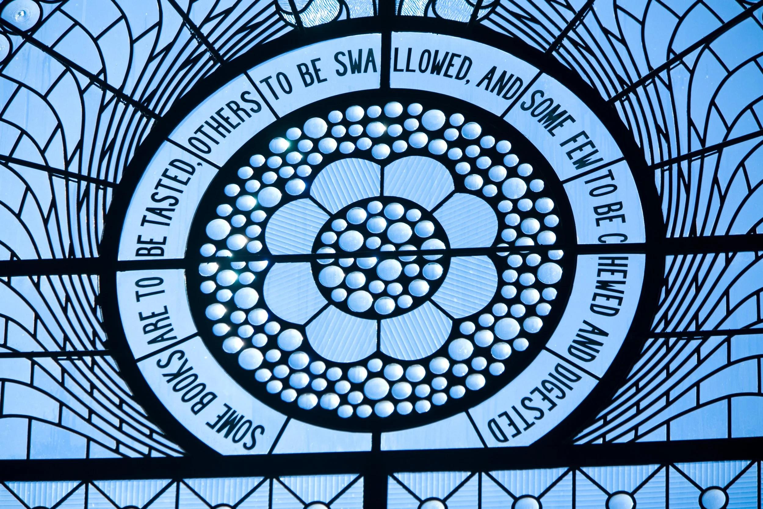   Literary sayings are the perfect decorative touch for a library’s windows.  