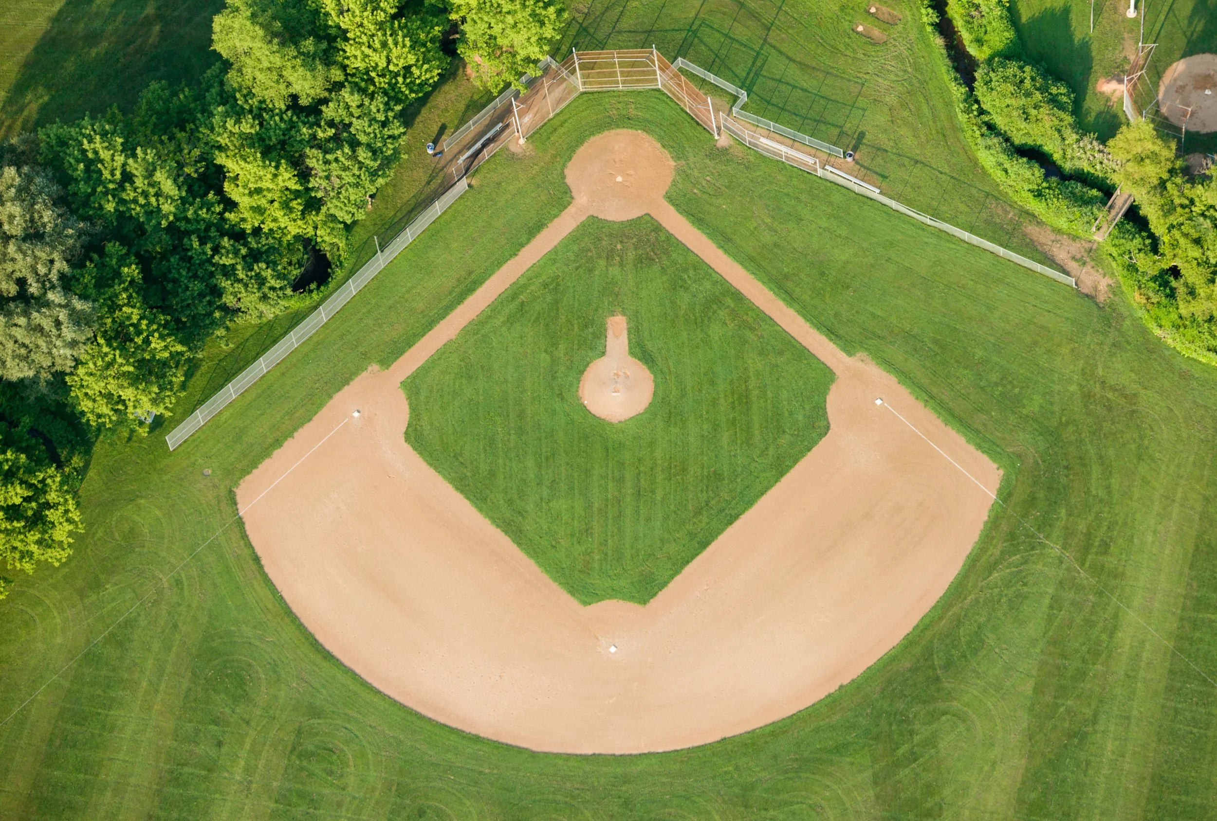  Bright green grass and freshly raked dirt make this field look extra sharp for spring.  