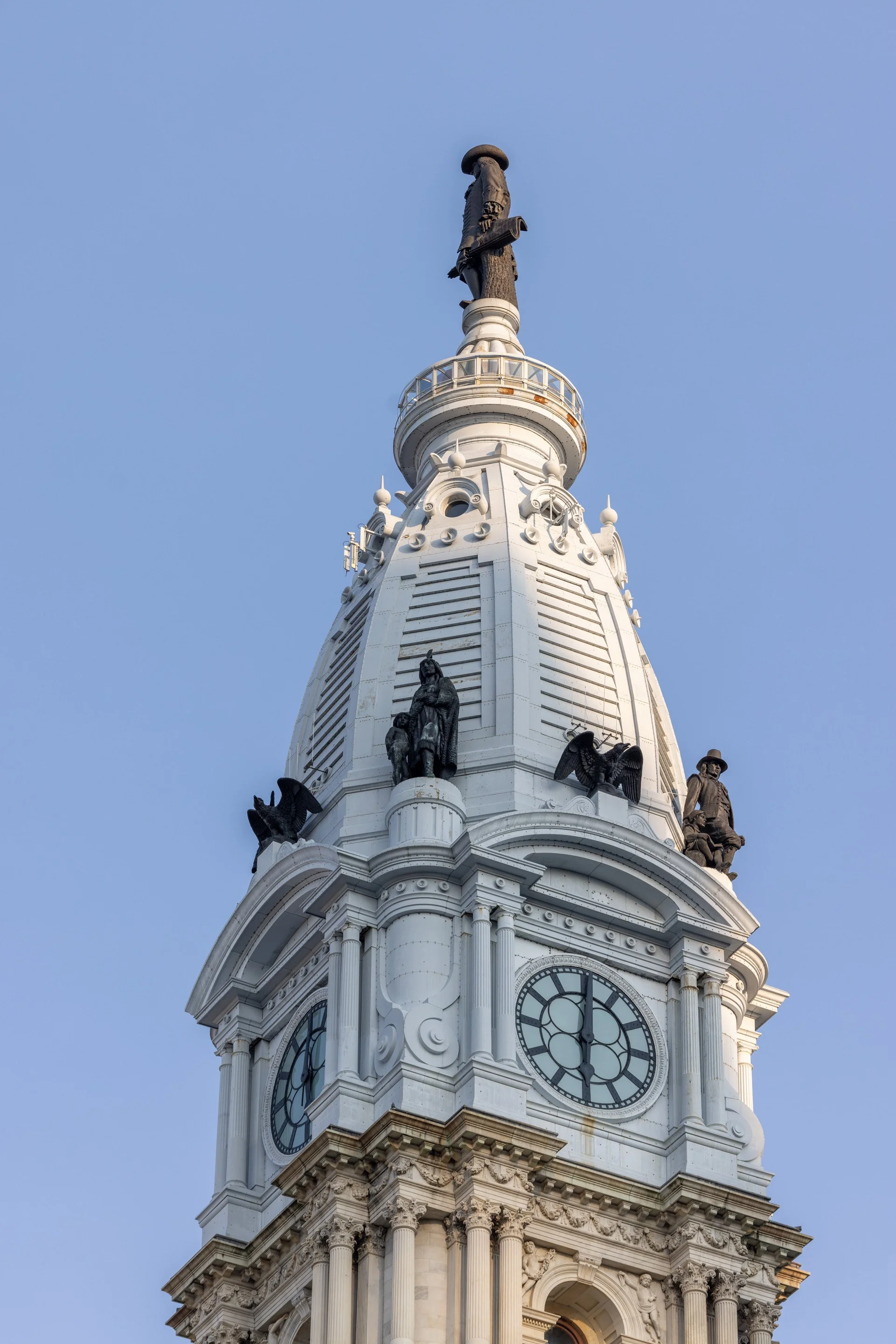  With a telephoto lens, I can photograph Penn and friends in stunning clarity—even from the ground half a block away.  