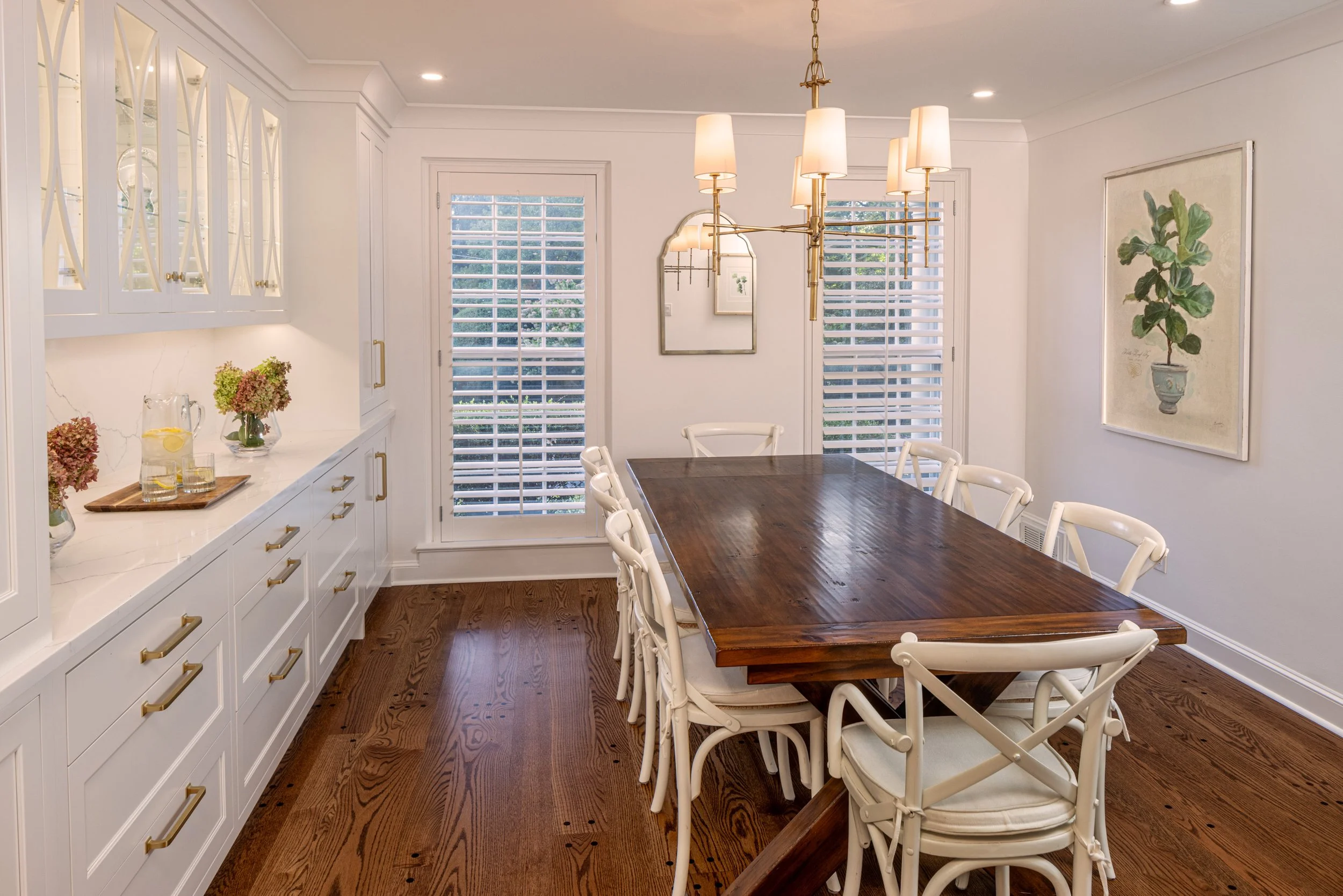   Similar aesthetic details continue from the kitchen into the dining room for a cohesive hosting space.  