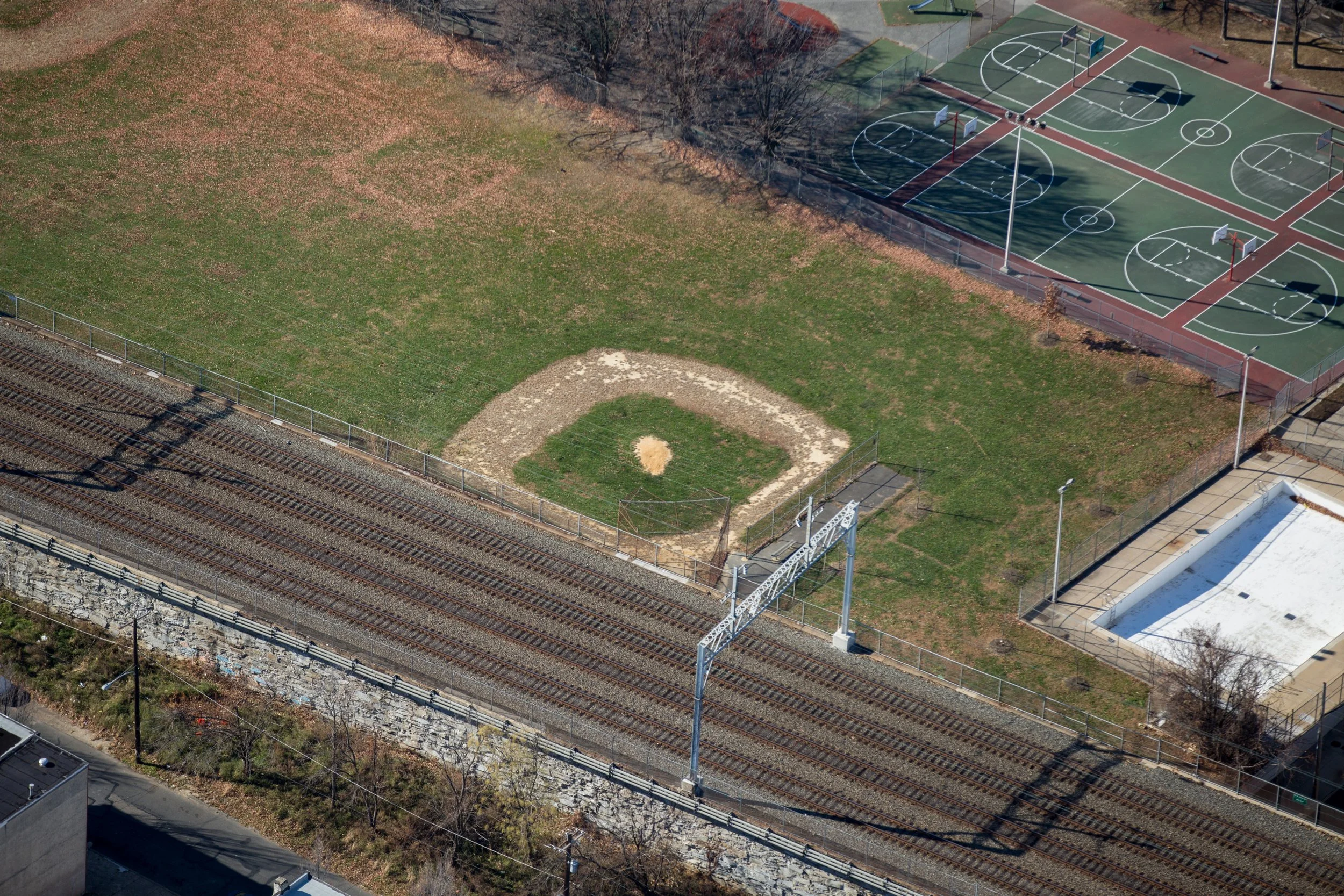   With space at a premium, this field fits snugly next to the main SEPTA train line through north Philadelphia, just south of Temple University Station.  
