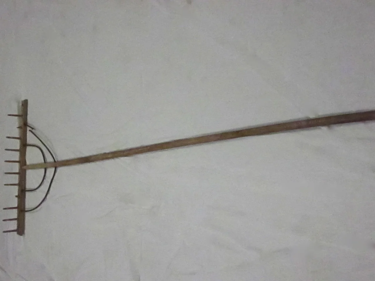 Wooden grass rake