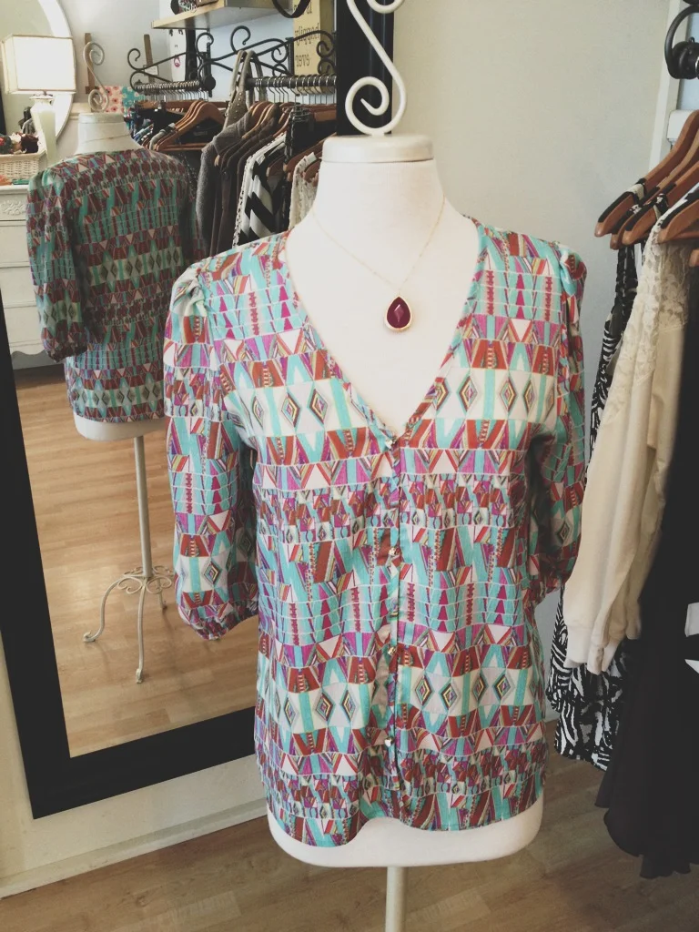 Multi-colored button up blouse