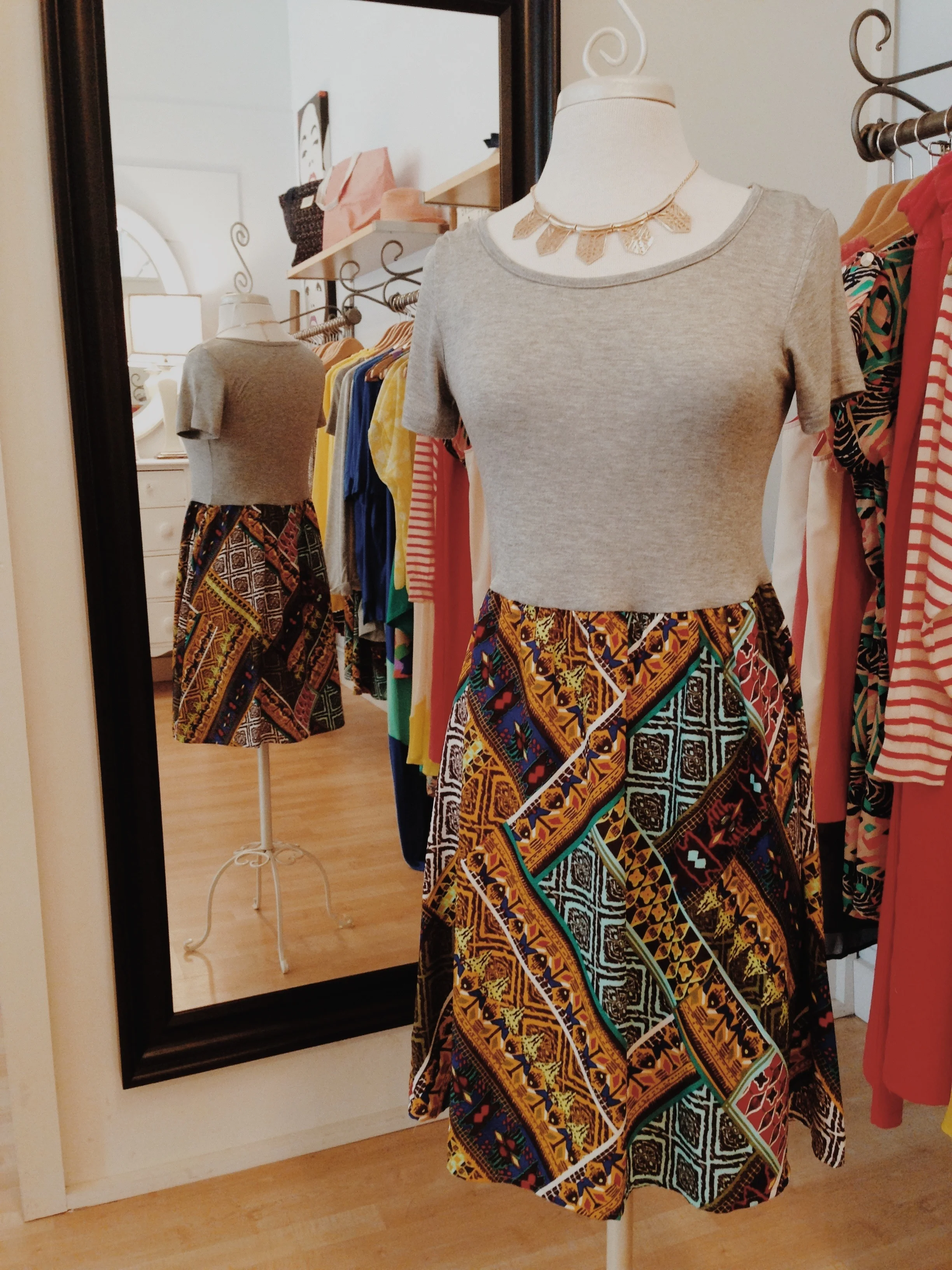 Print dress. It would look great with a pair of riding boots!
