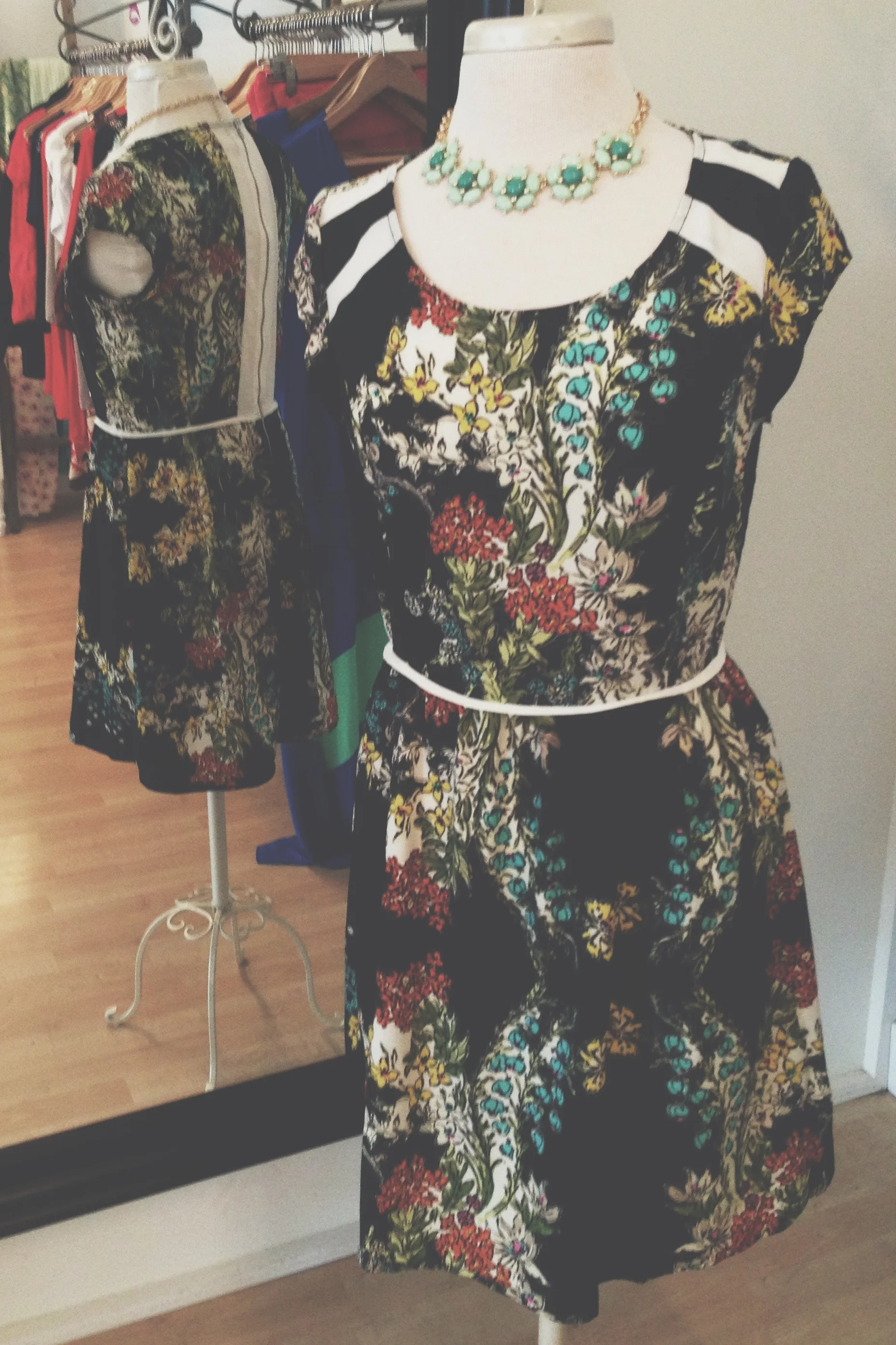 Love Stitch floral print dress, pictured with one of our unique necklaces.