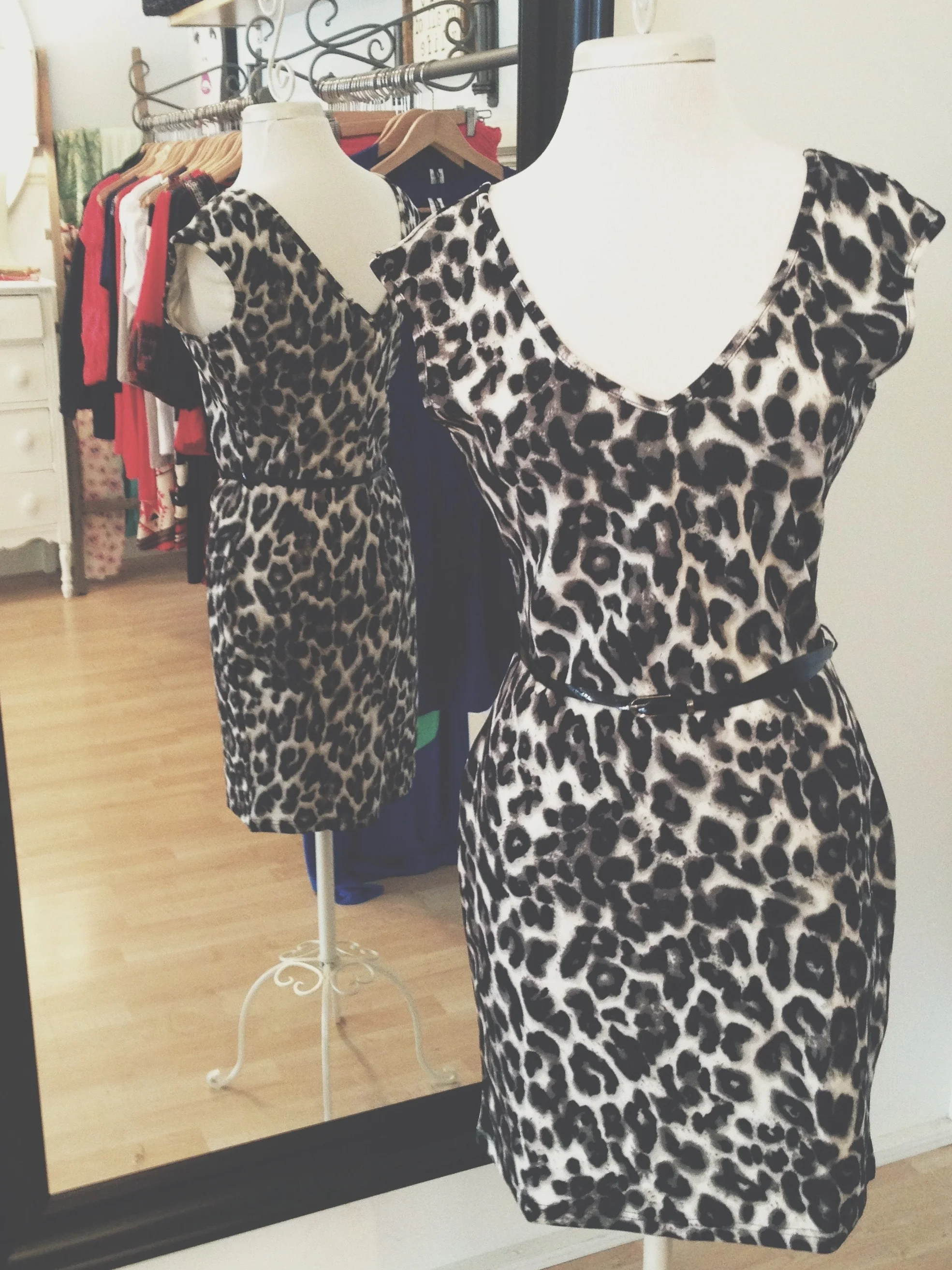 Friday night out with the gals? Bonus: The belt comes with this leopard print v-neck dress!