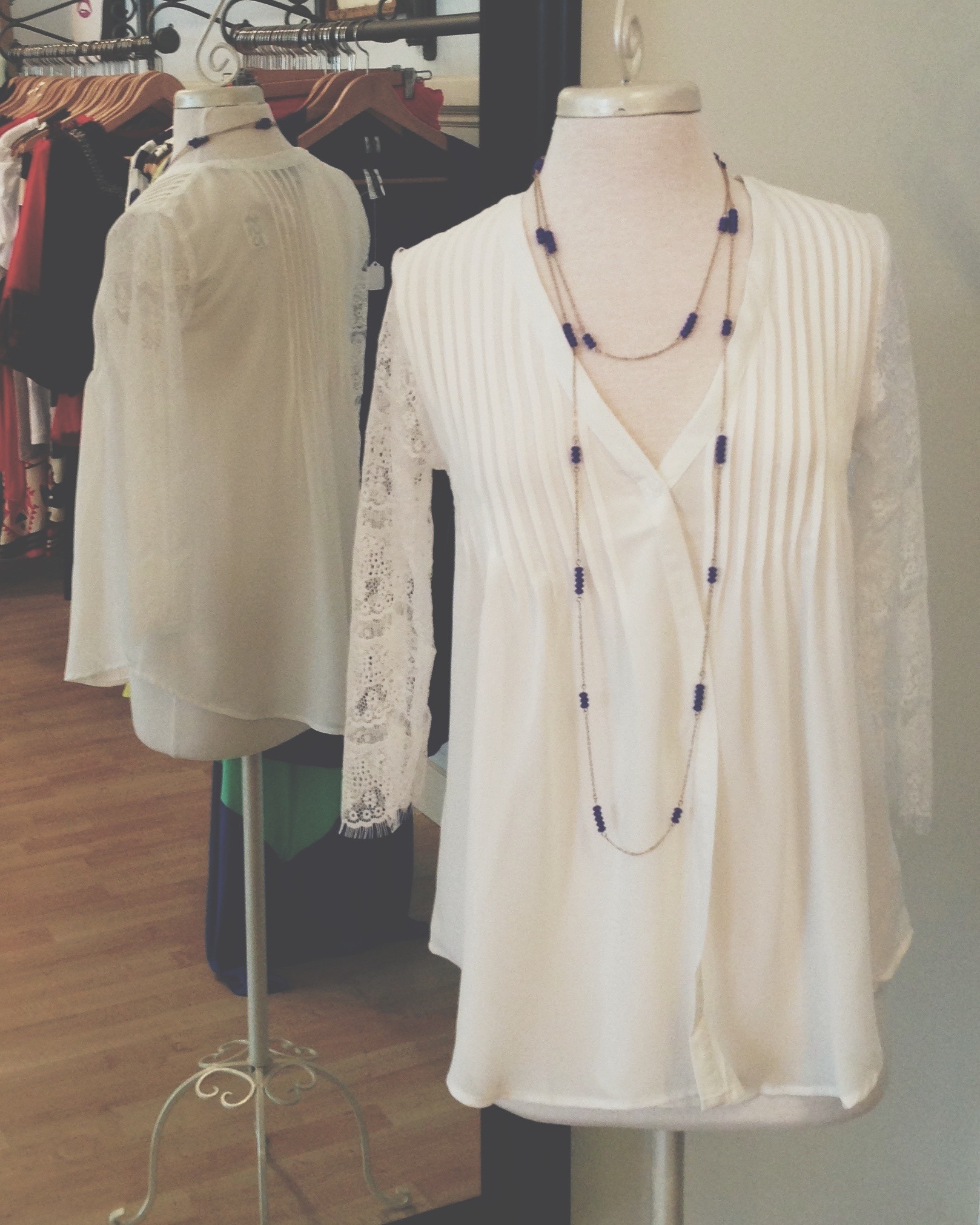 Sheer top and lace 3/4 length sleeves, with pretty details on the front.