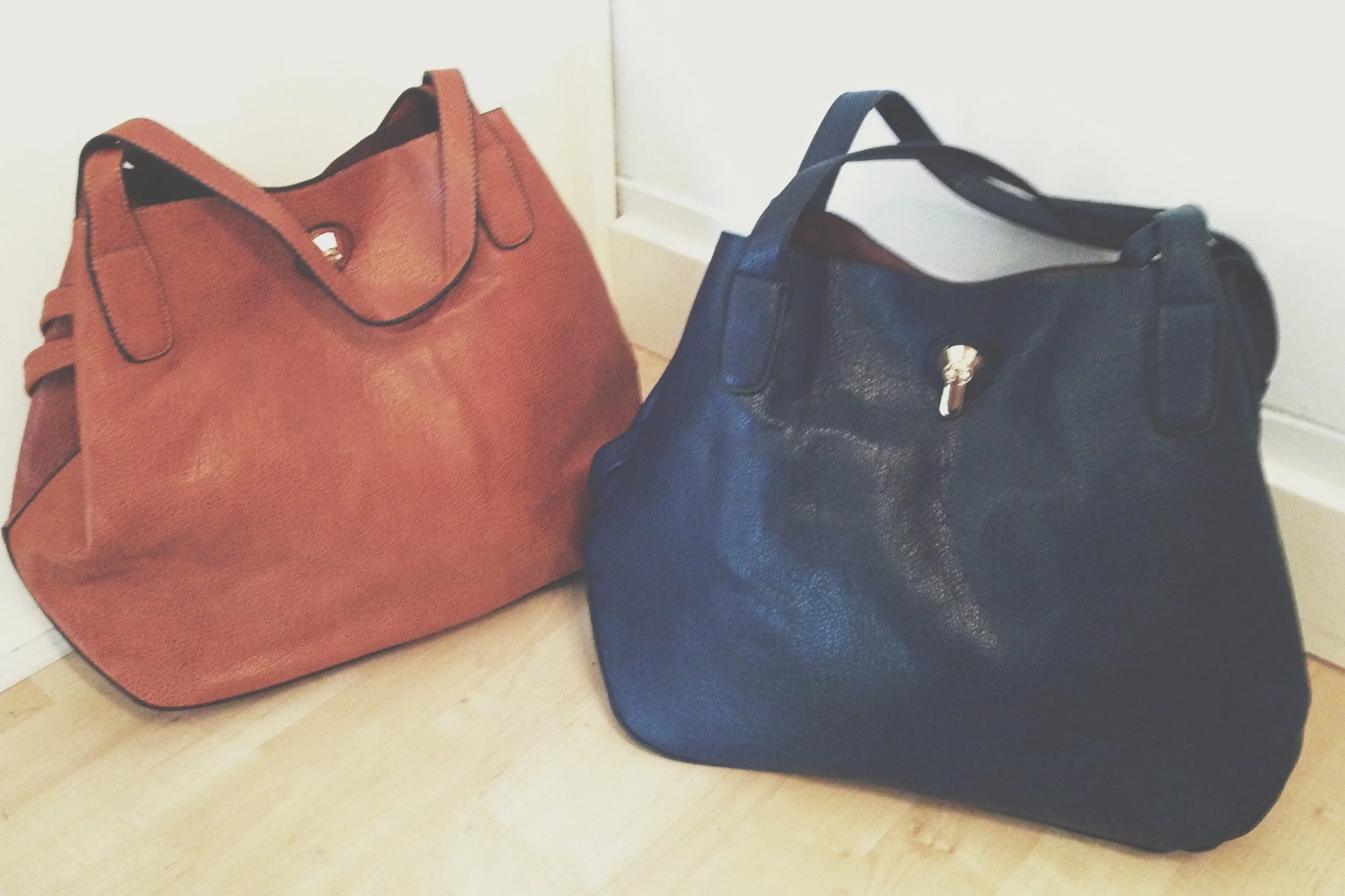These purses are adorable, and they come with cross-body strap!