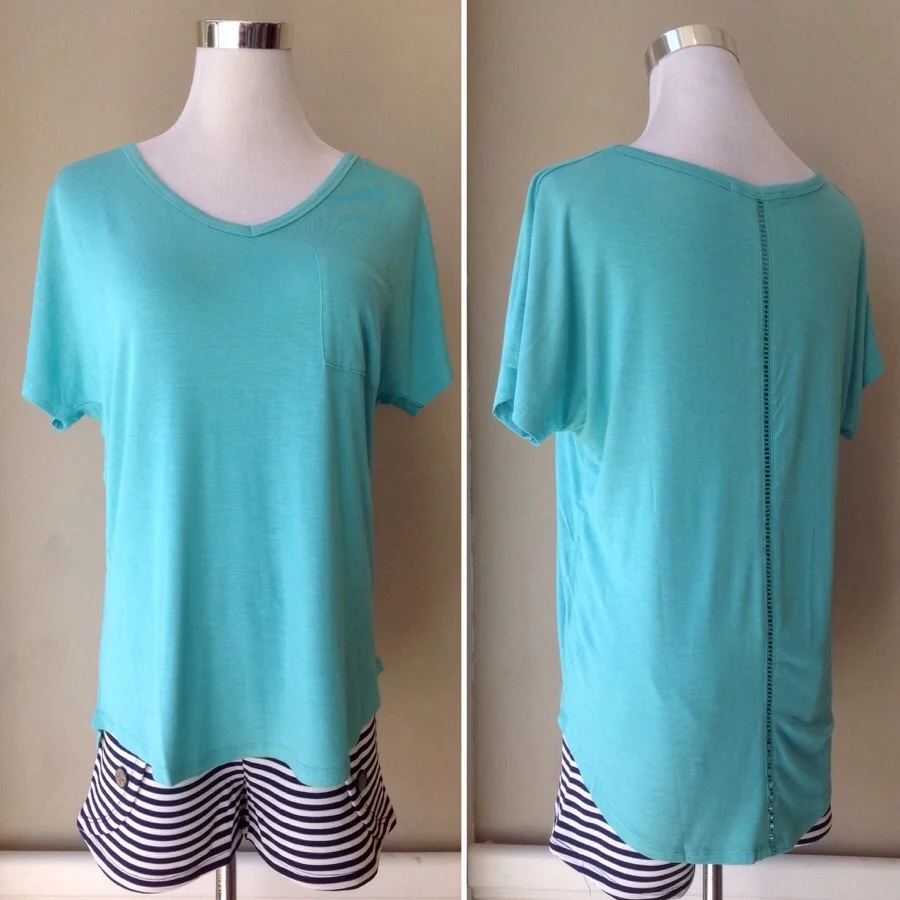 Dolman sleeve tee with center back trim in deep mint, $26