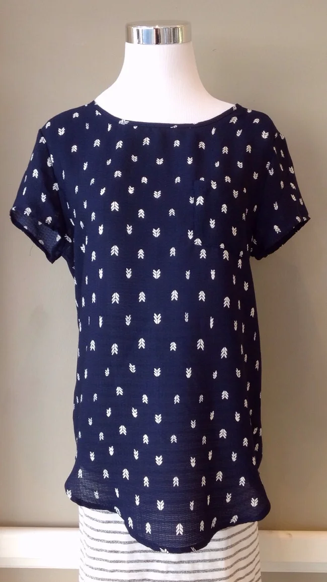 Navy woven print top with patch pocket, $32