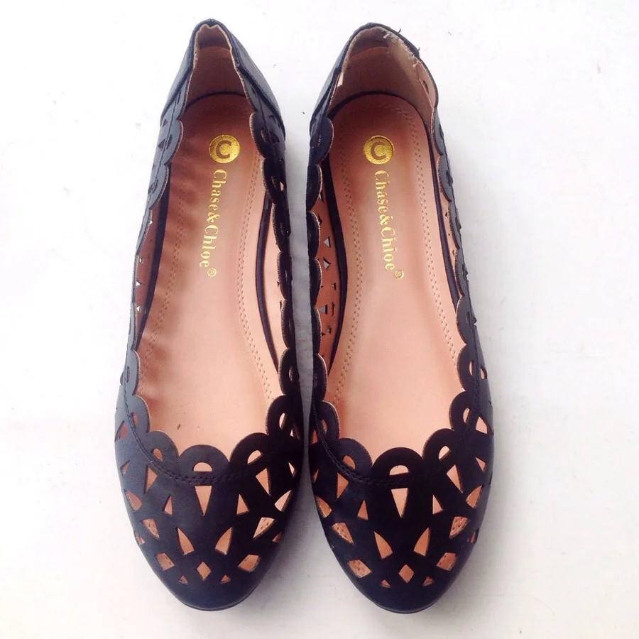 Laser cut black ballet flats, $34