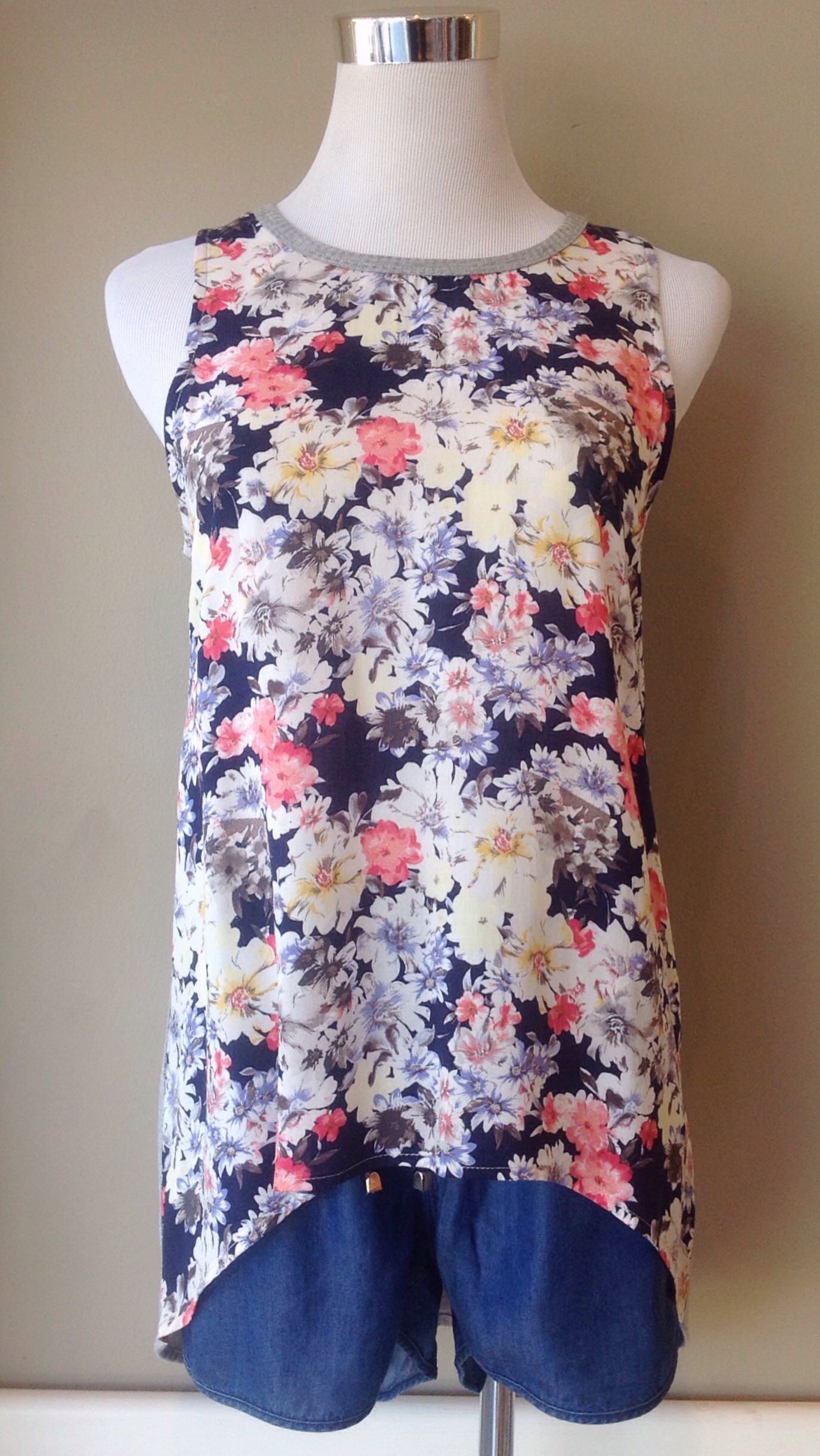 Floral tank with solid grey knit back and high-low hem, $32