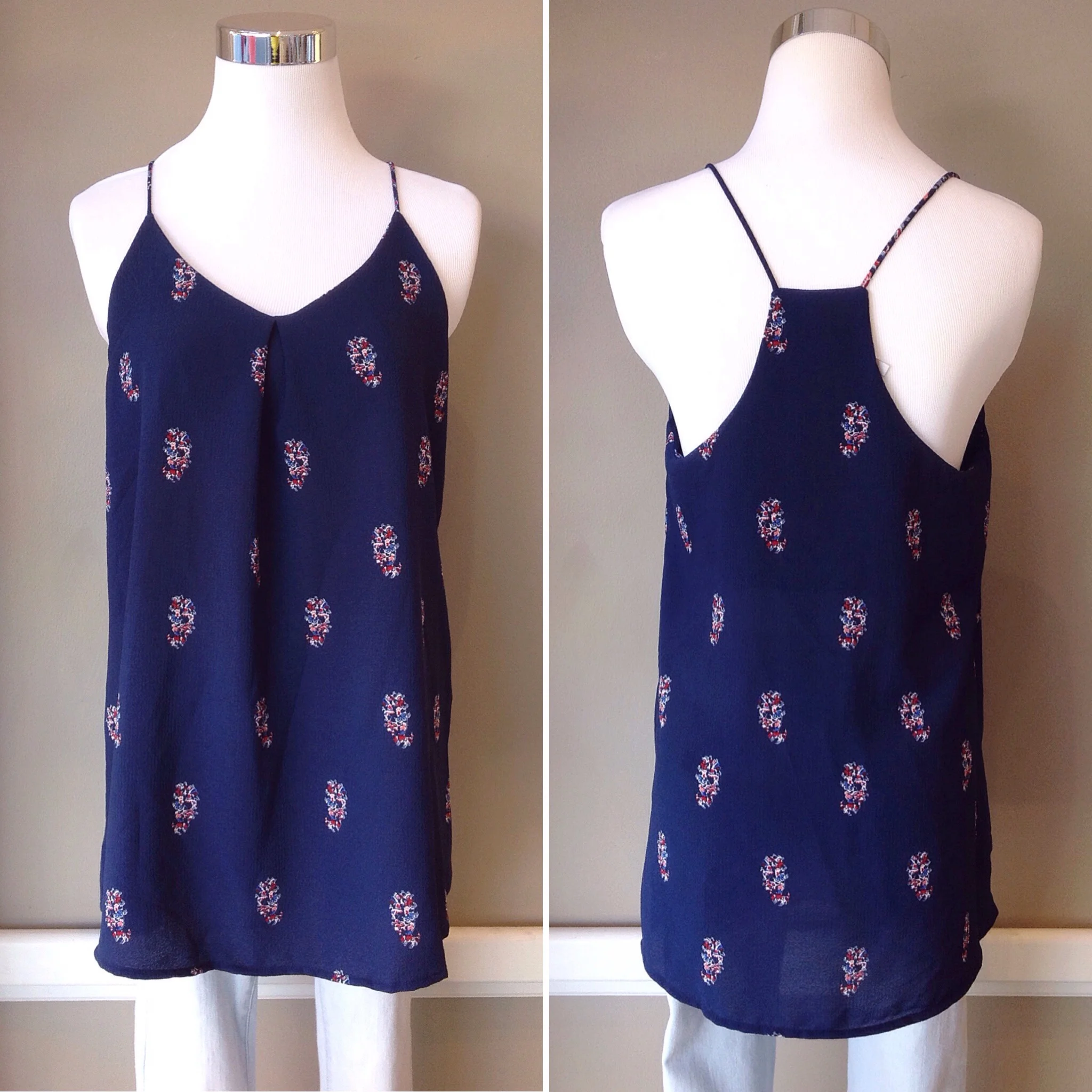 Navy floral print woven tank with front pleat and racer back, $32