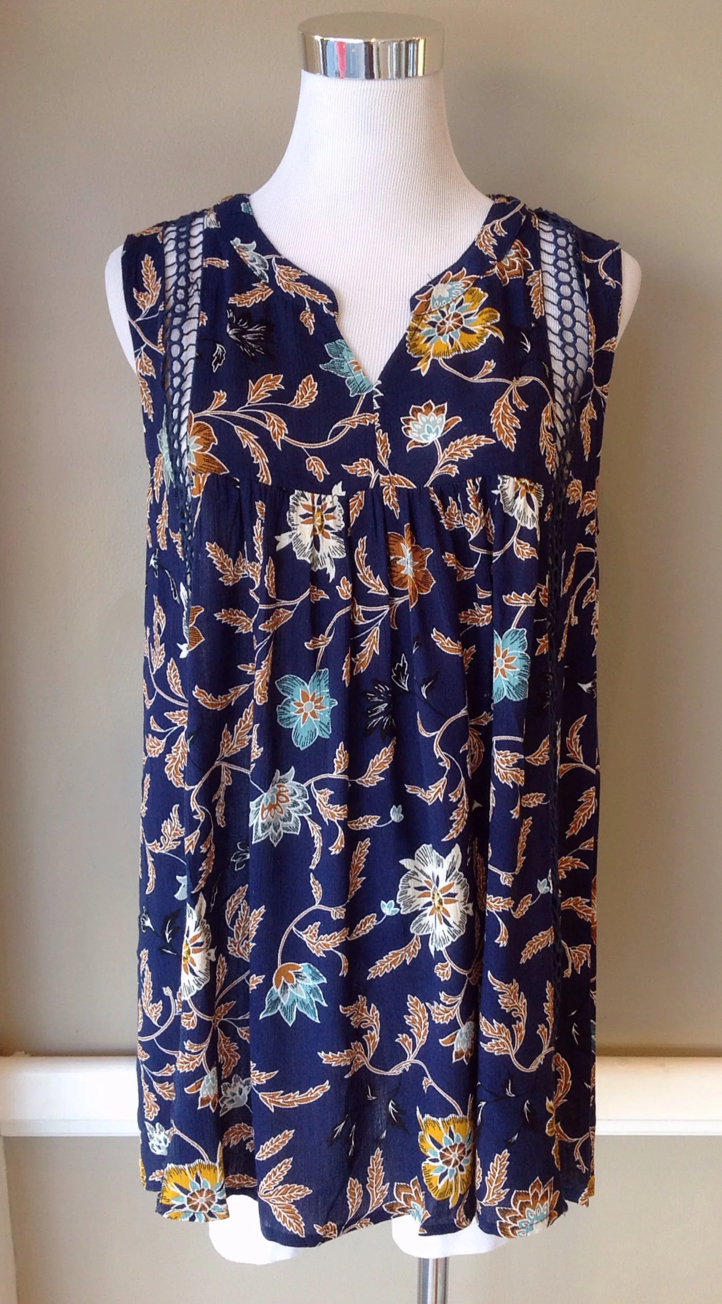Navy floral print tank with lace trim, $34
