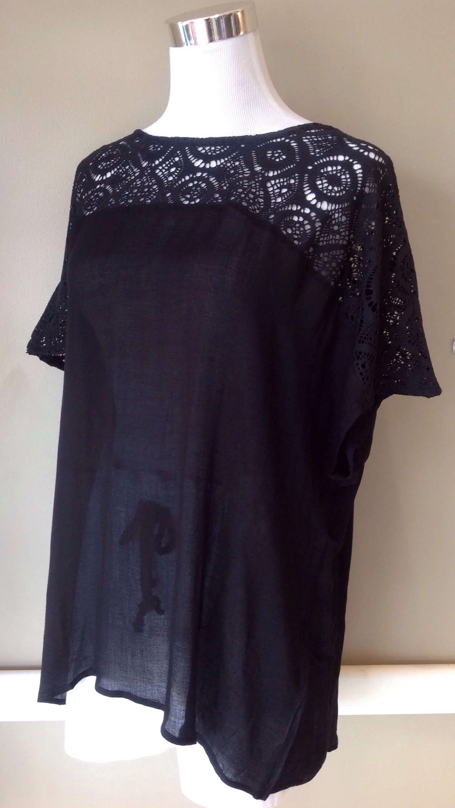 Black lightweight blouse with lace yoke, $38