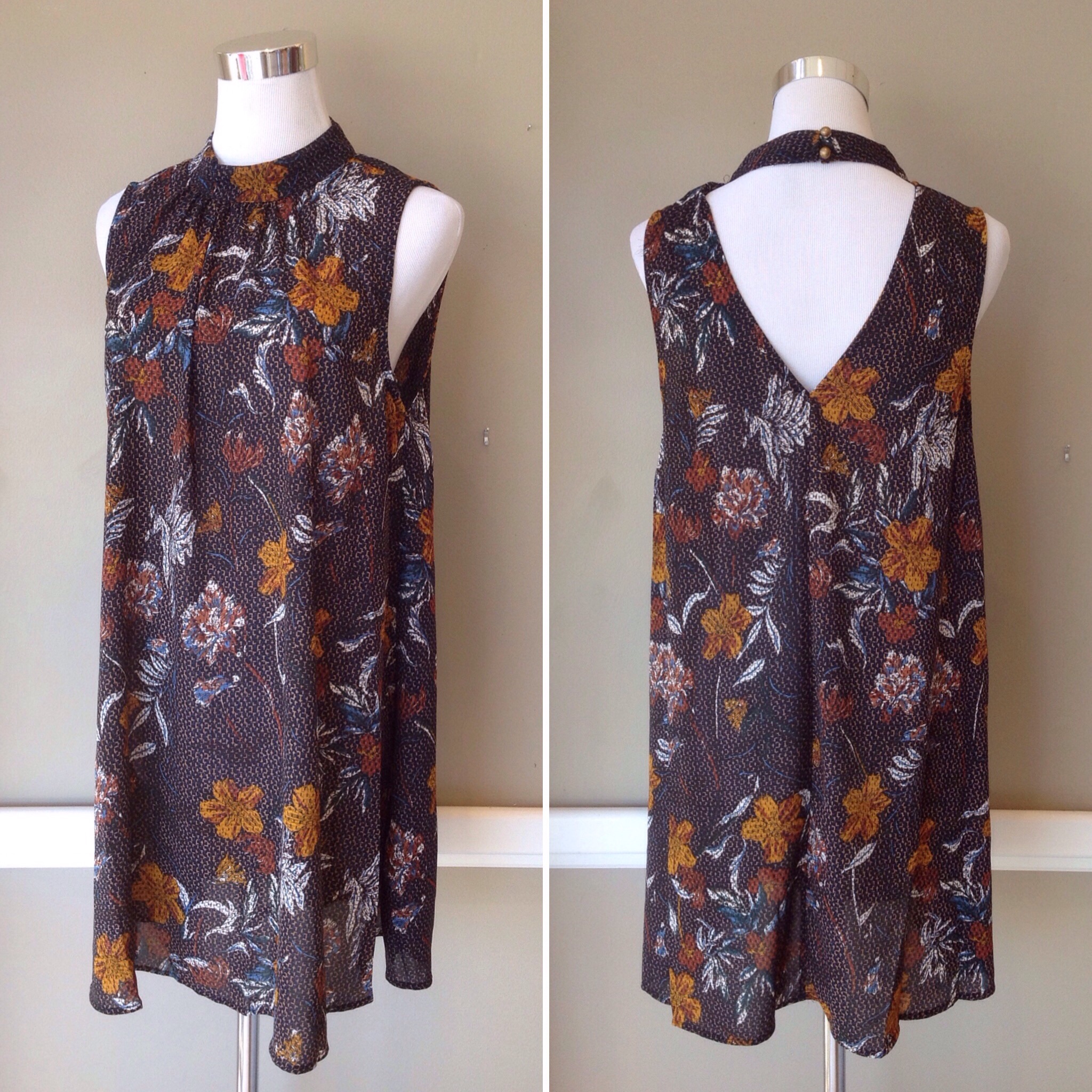 Woven floral print tunic in navy/multi , $38