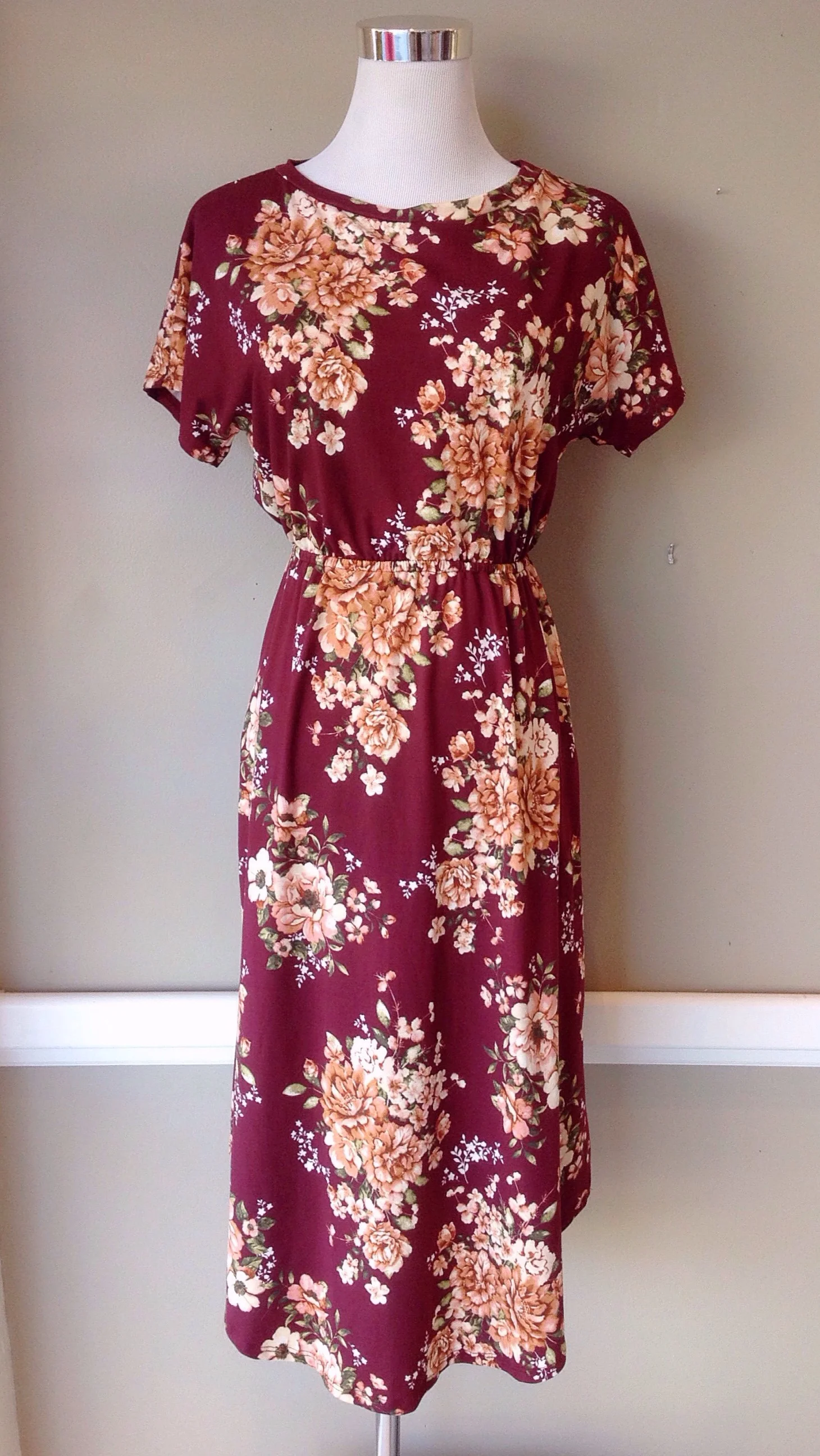 Soft floral midi dress with gathered waist in burgundy, $38