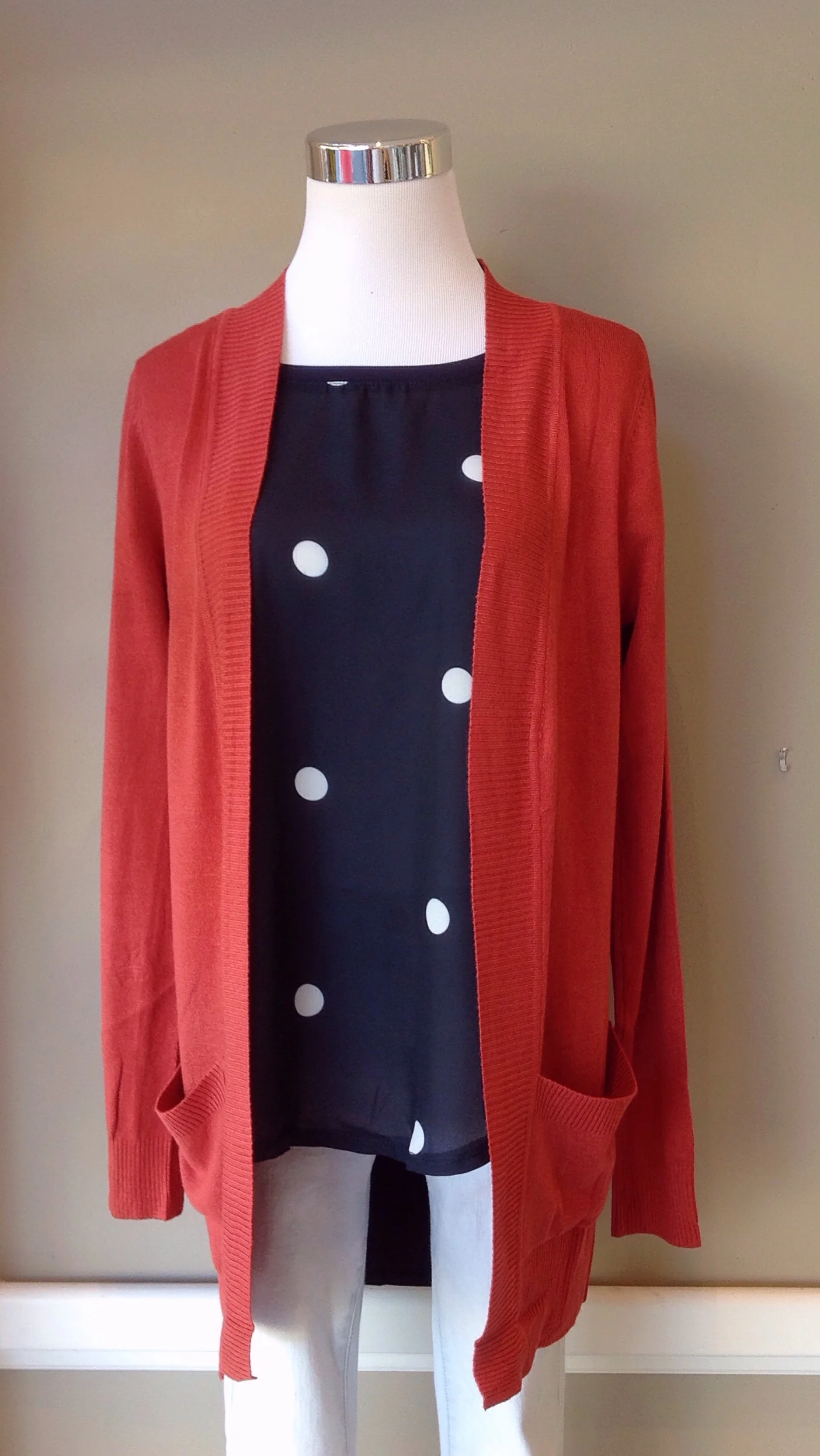 Open front knit cardigan In persimmon, $34. Also available in plum.