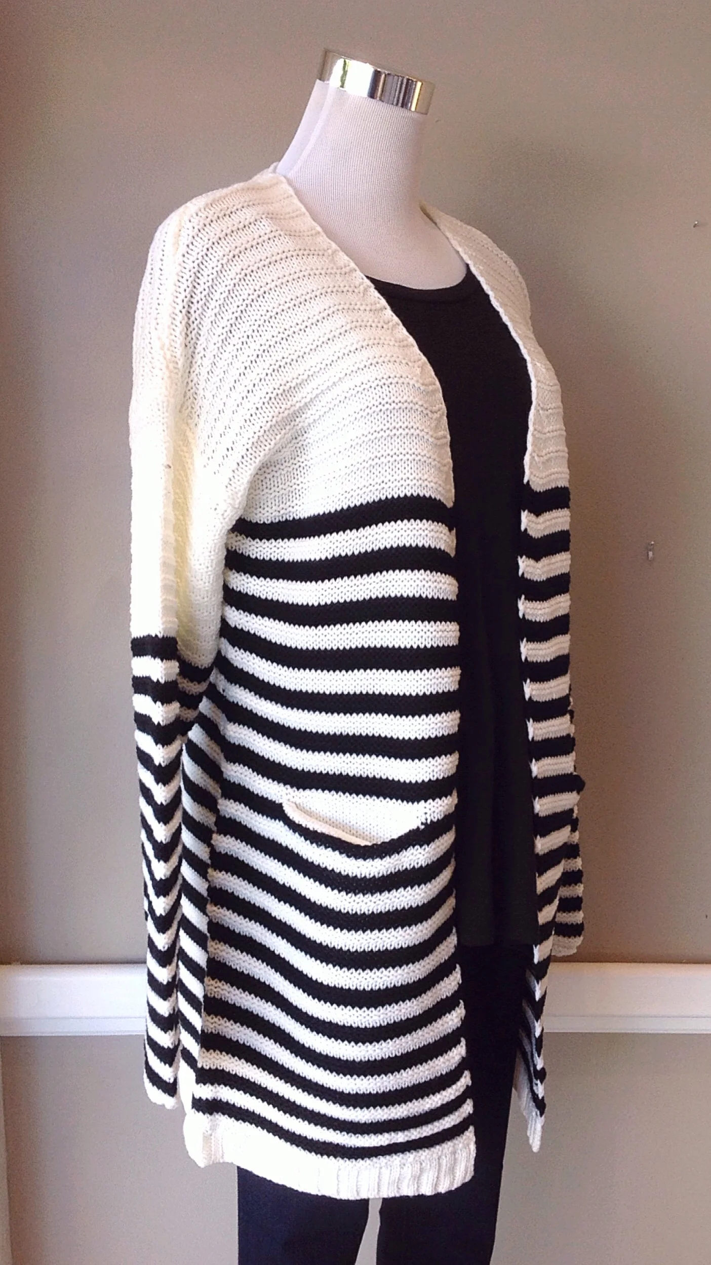 Chunky knit striped cardigan with pockets in black and ivory, $38