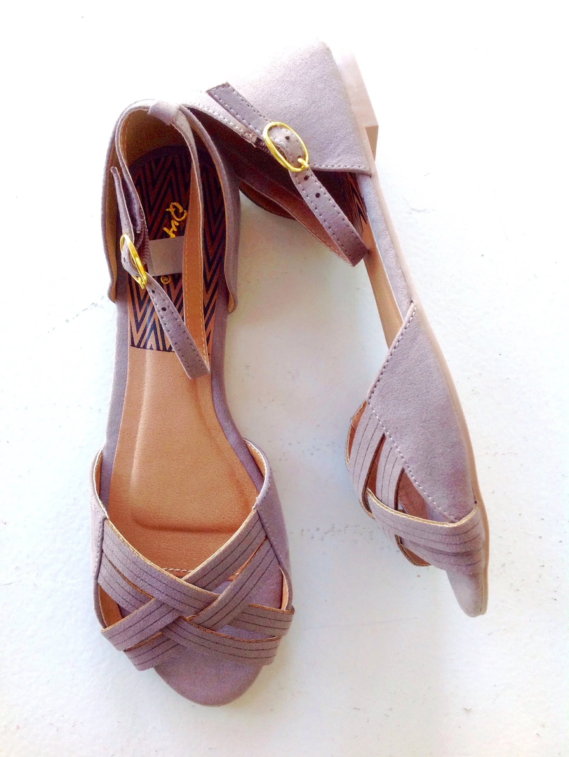 Taupe faux suede sandals. $32