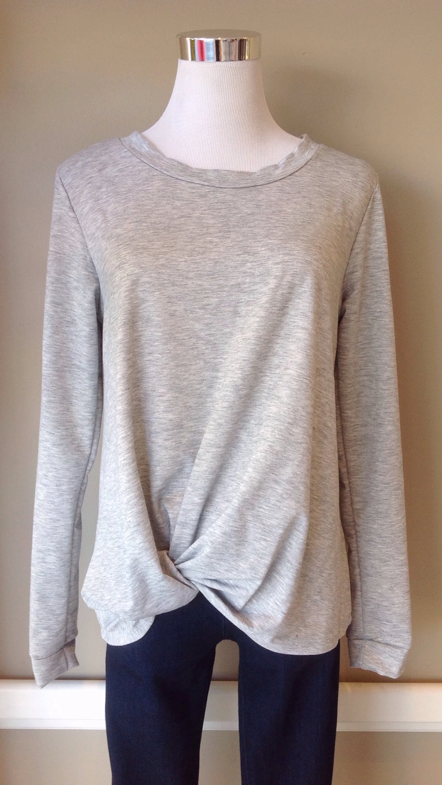 Twist front long sleeve top in heather grey. Also available in black.