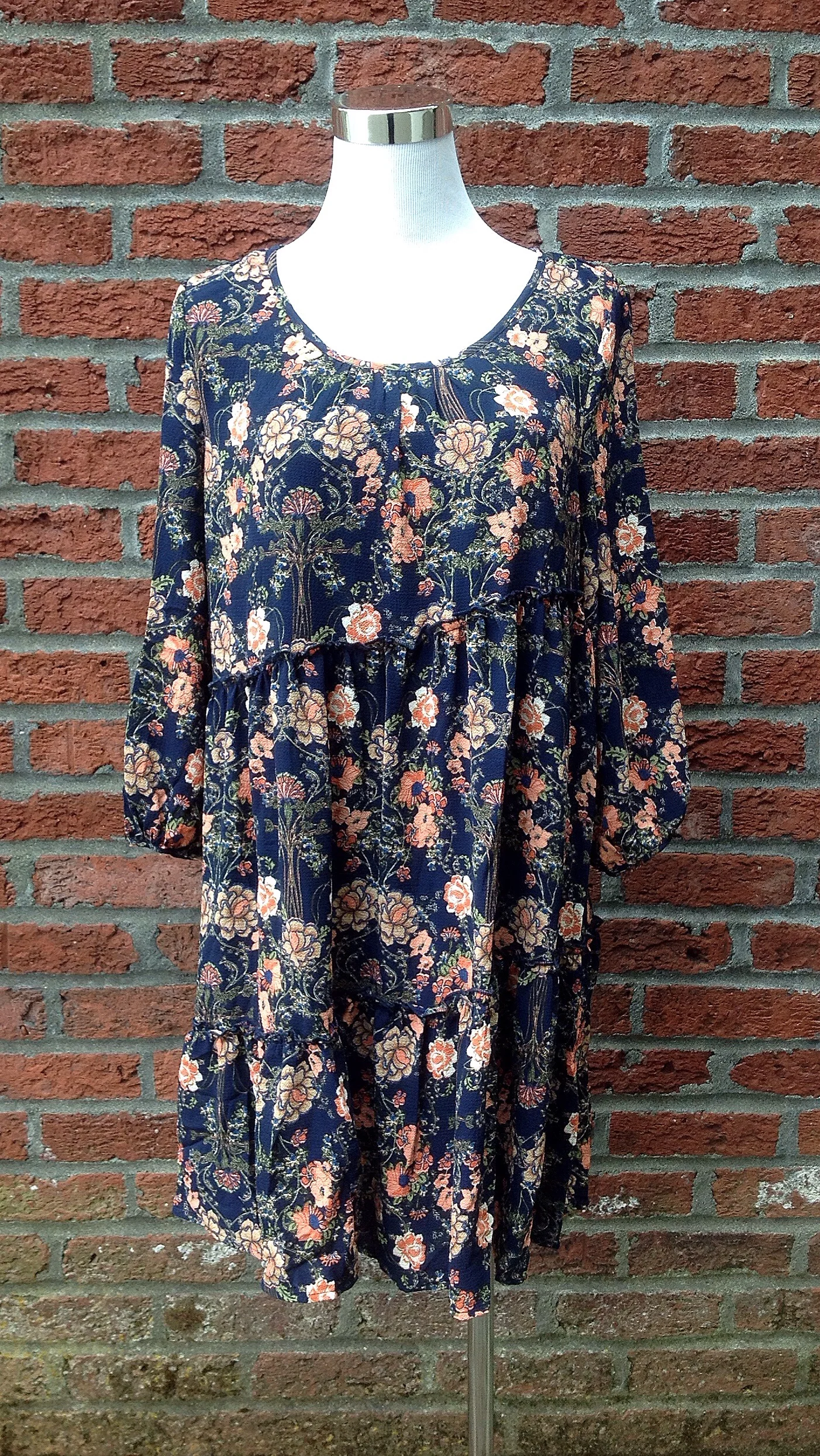 Navy floral babydoll dress with 3/4 sleeves, $42