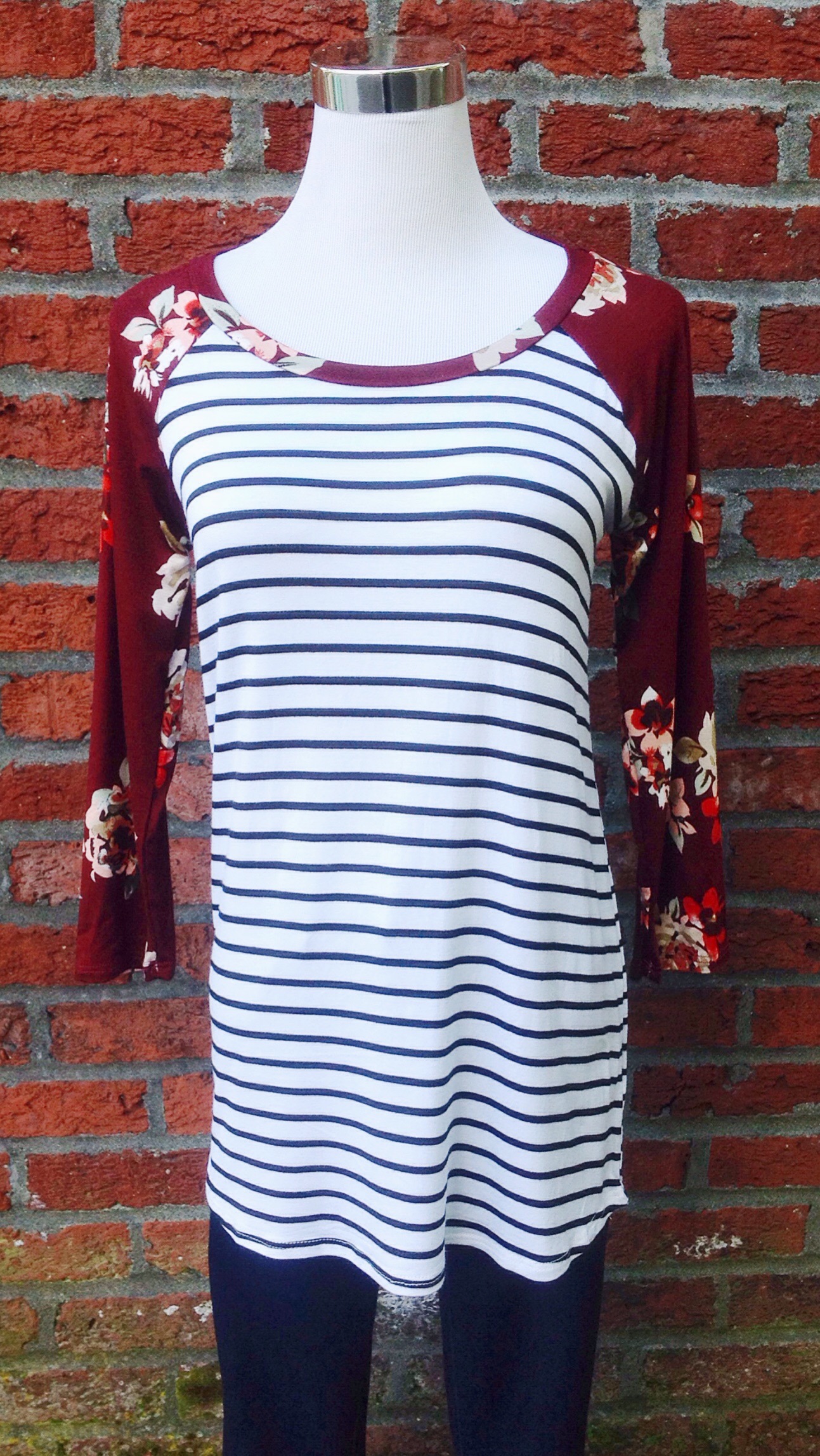 Stripe jersey knit baseball top with contrasting floral sleeves, $28