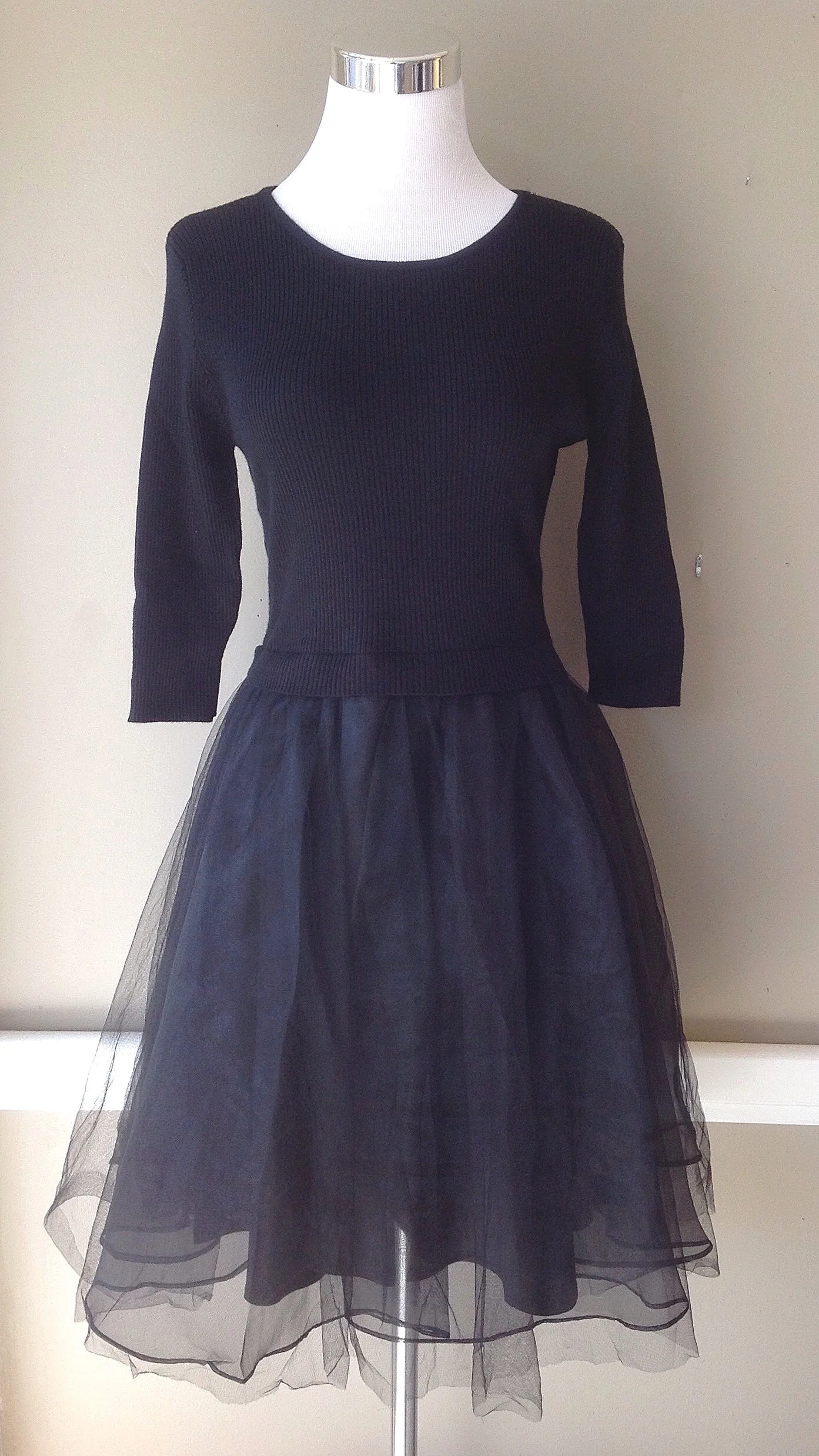 Black party dress with knit bodice, and tulle and chiffon skirt, $64