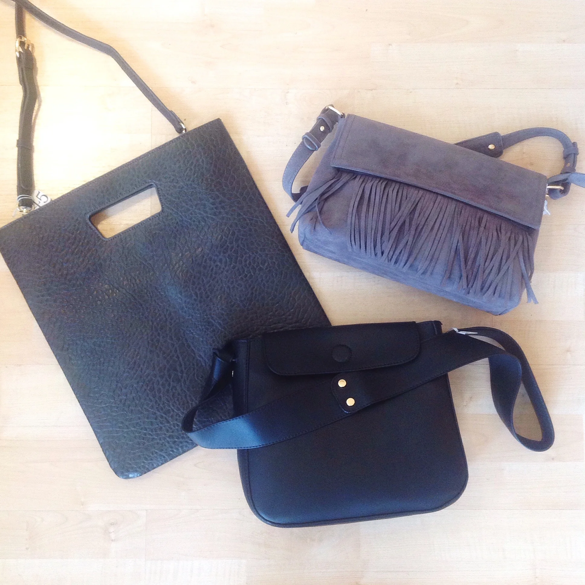 Assorted faux leather handbags from $42