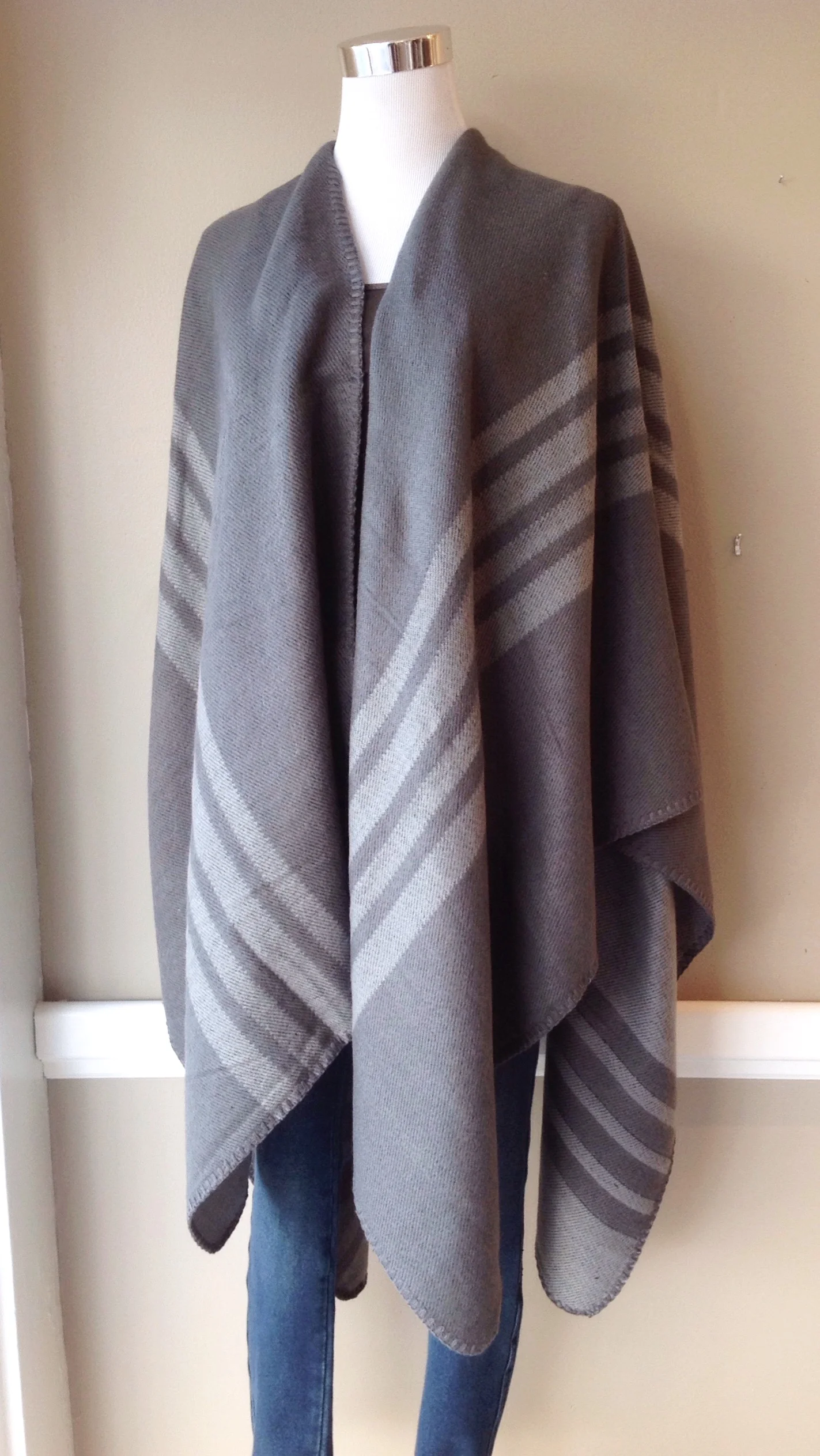Reversible stripe poncho in grey