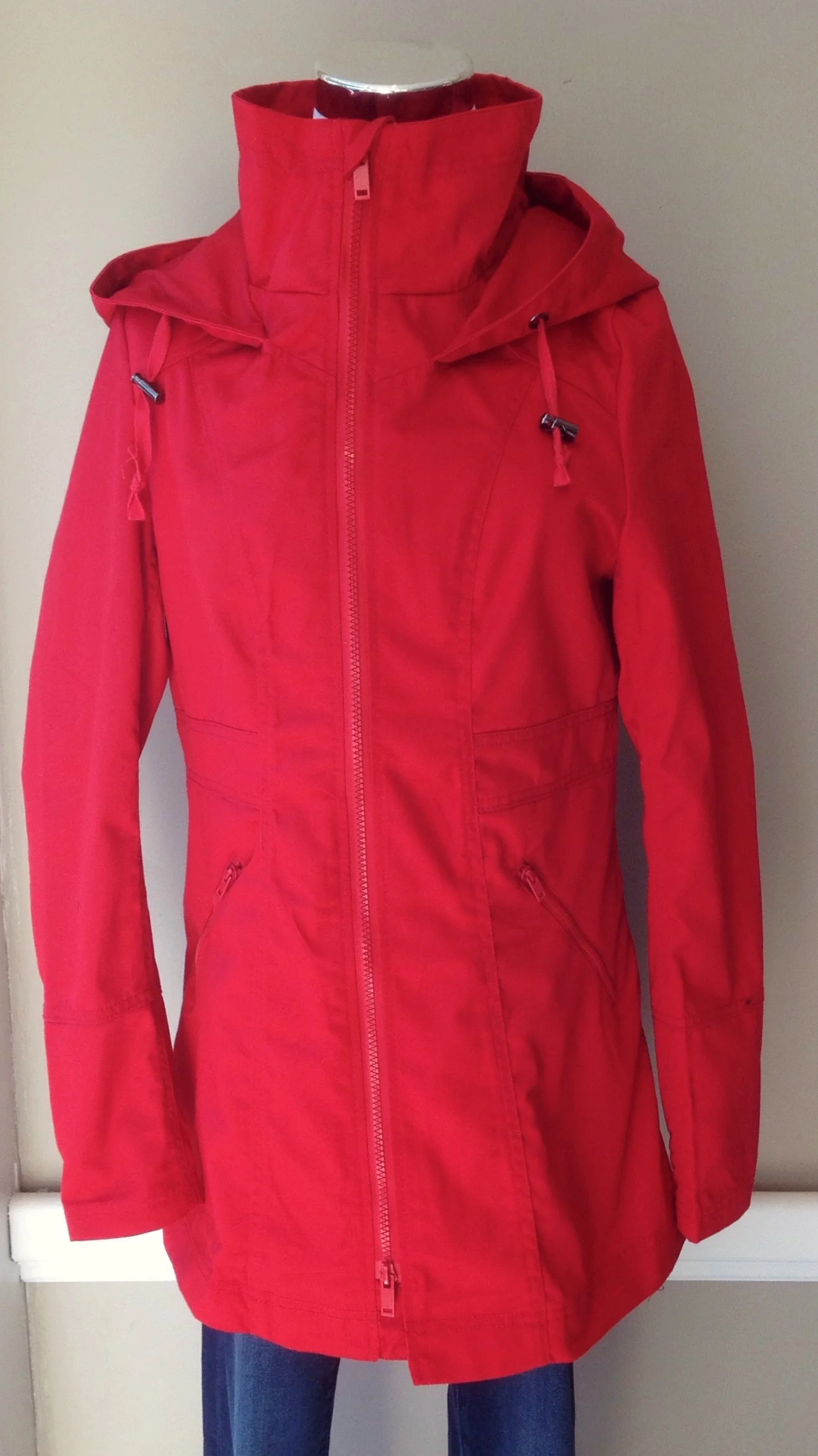 Water resistant utility jacket with high collar, hood and cinched back waist, $48