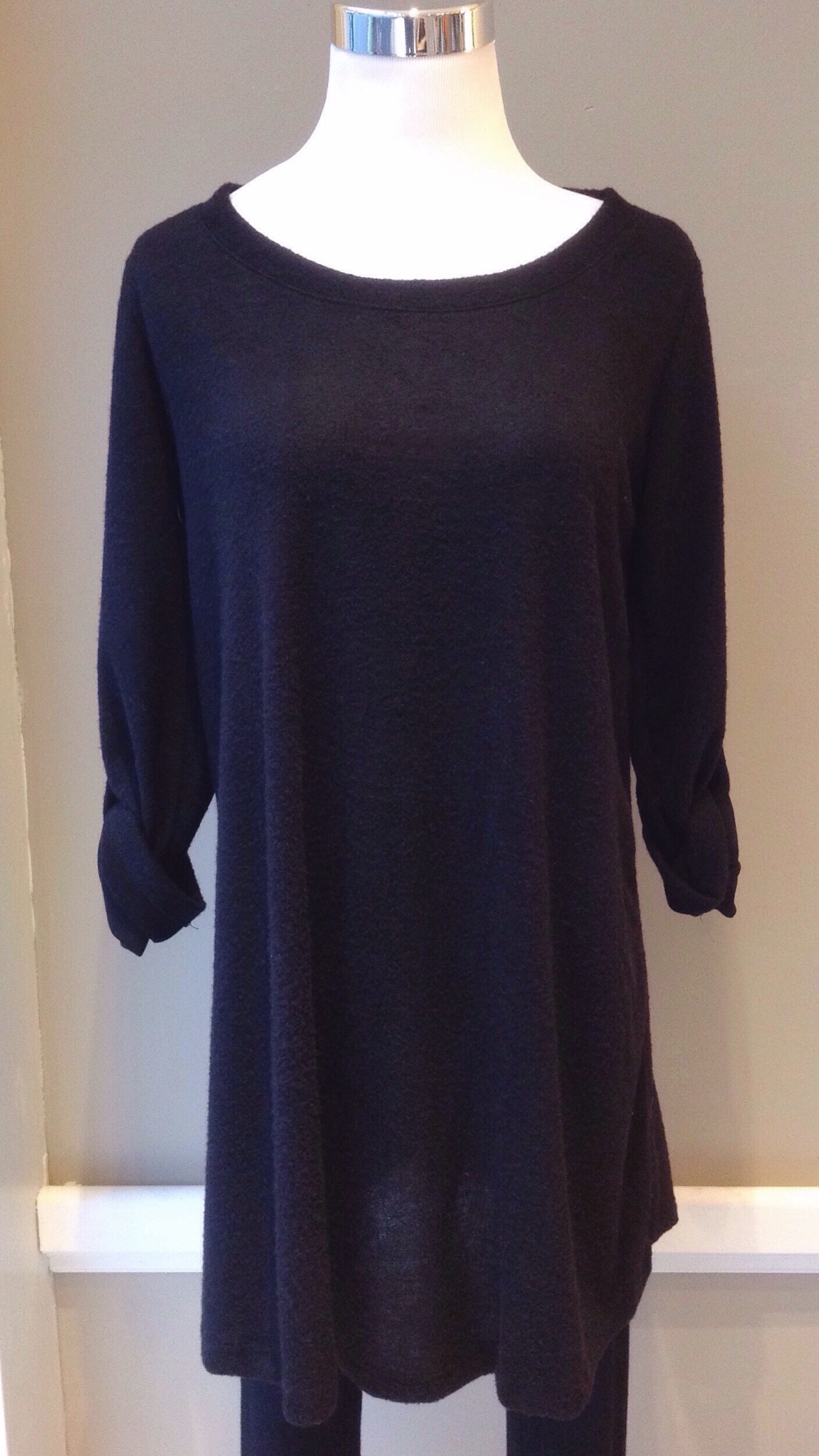 Soft sweater knit tunic with roll tab sleeves, $35