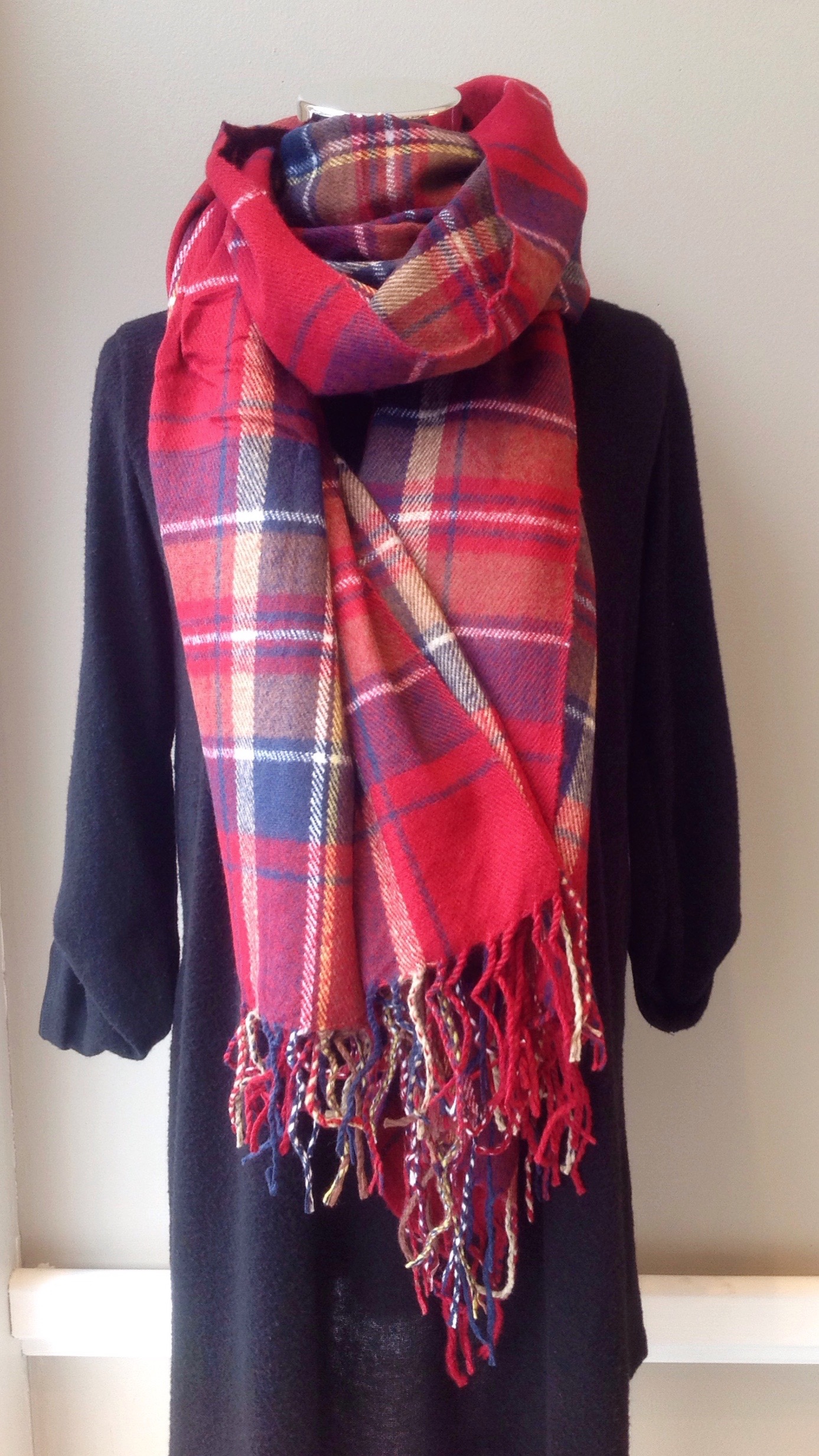 Plaid blanket scarf, $26. Additional styles and colors available!