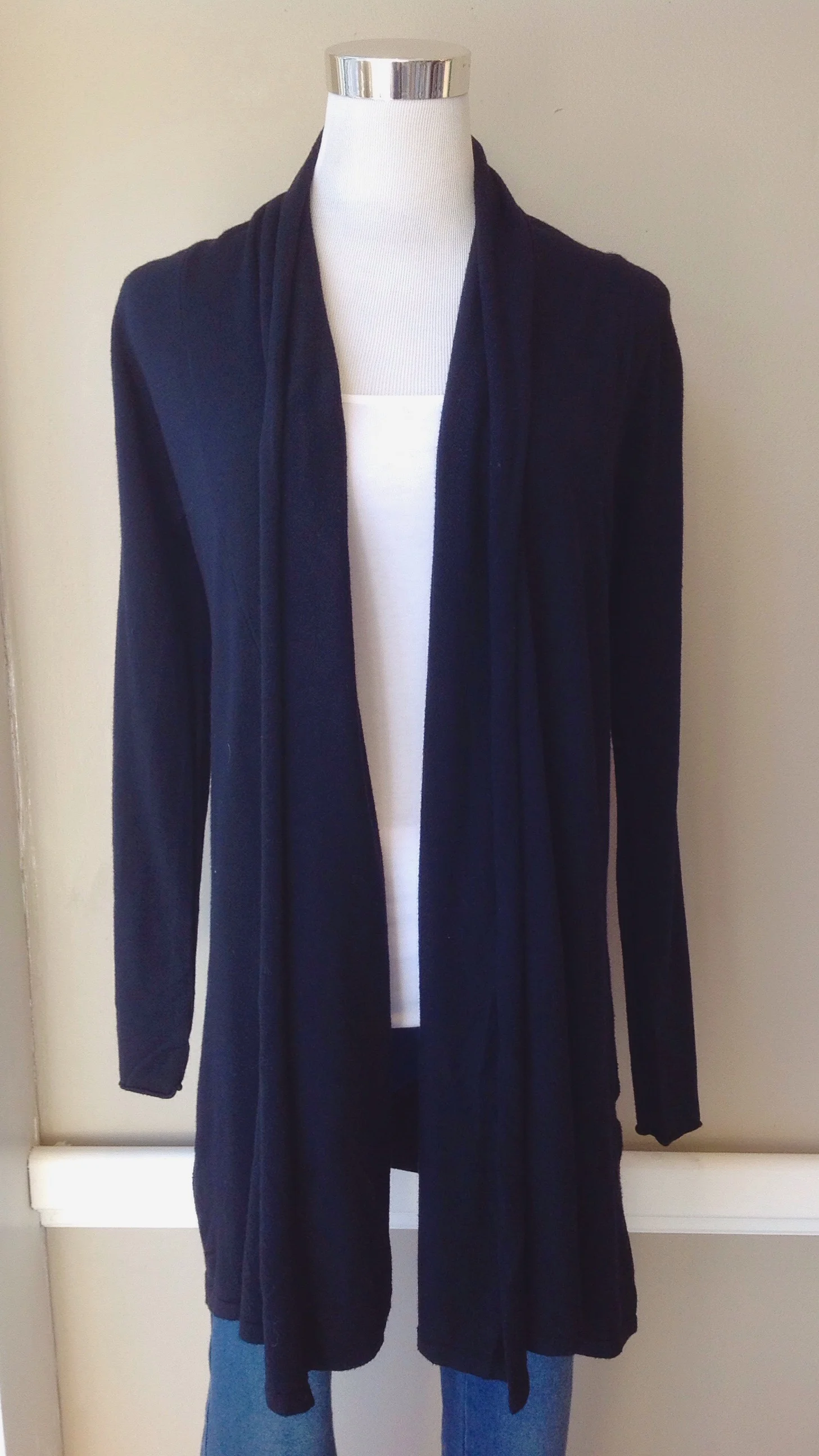 Ultra soft swing cardigan in black. $38