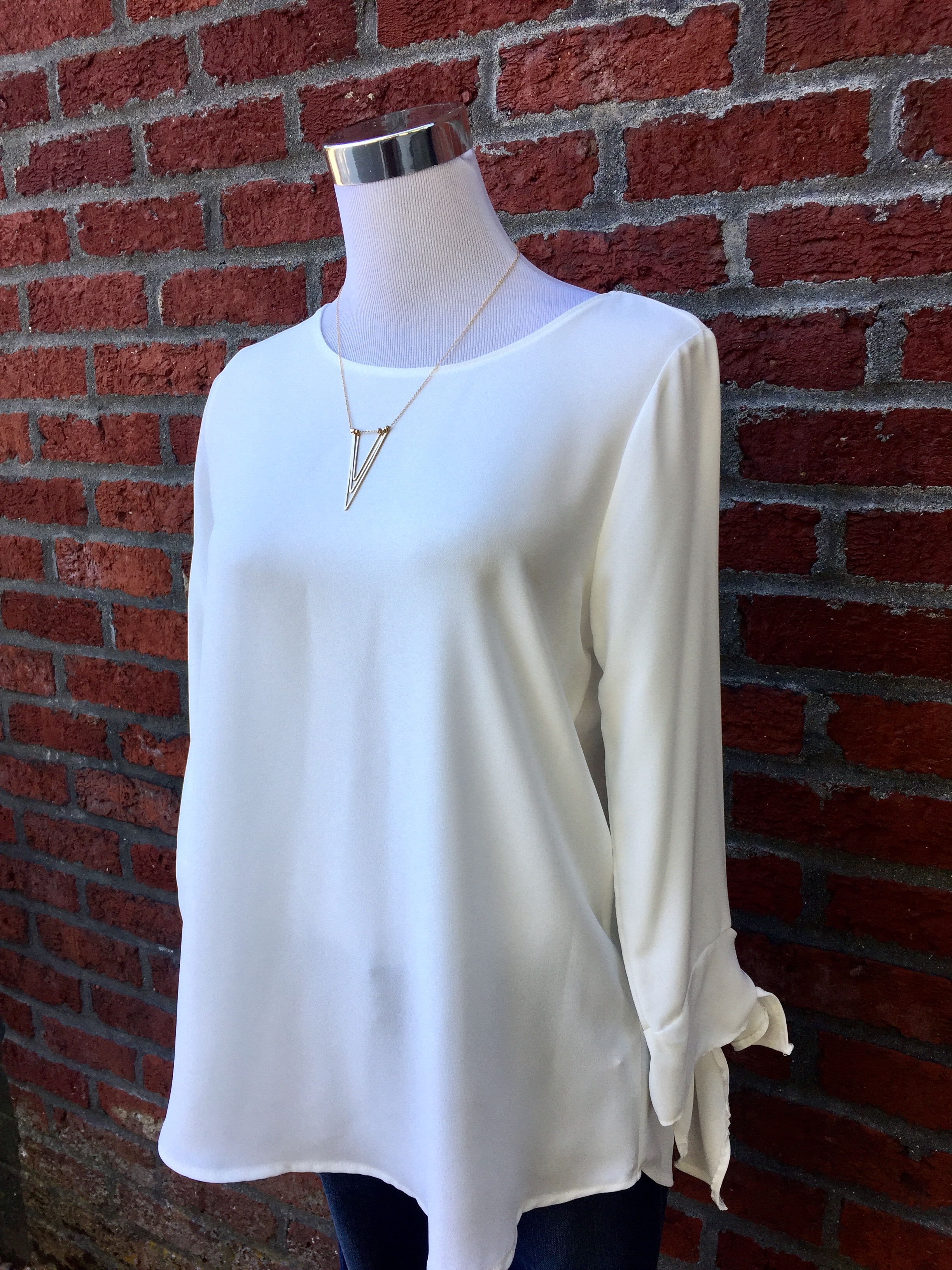 Le Lis Ivory Blouse ($28)